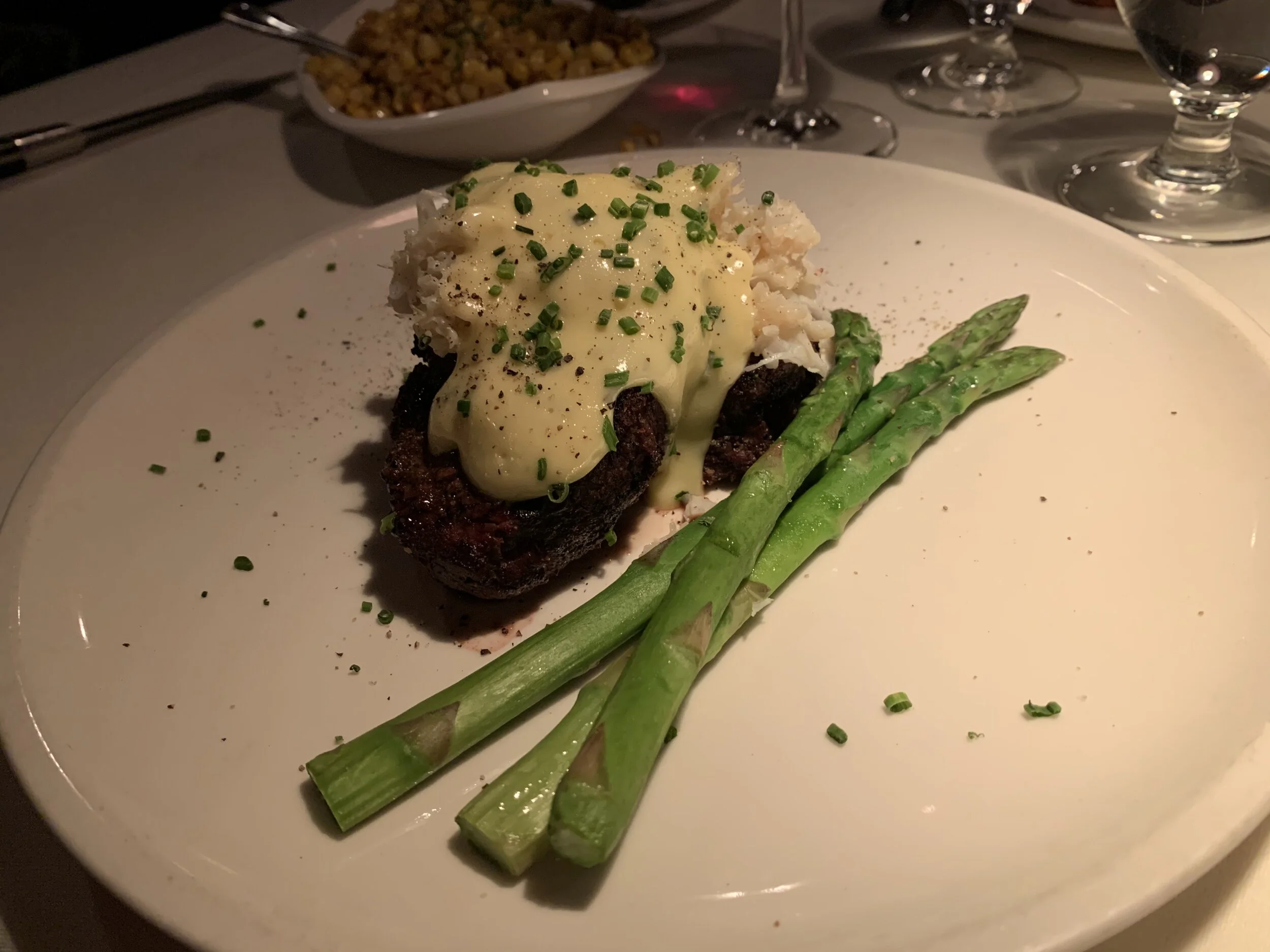  Two Filet Mignon’s “medallions” with Oscar (Bernaise sauce and crab)…with asparagus. Oh wow. Image Courtesy: Dan Meyers 