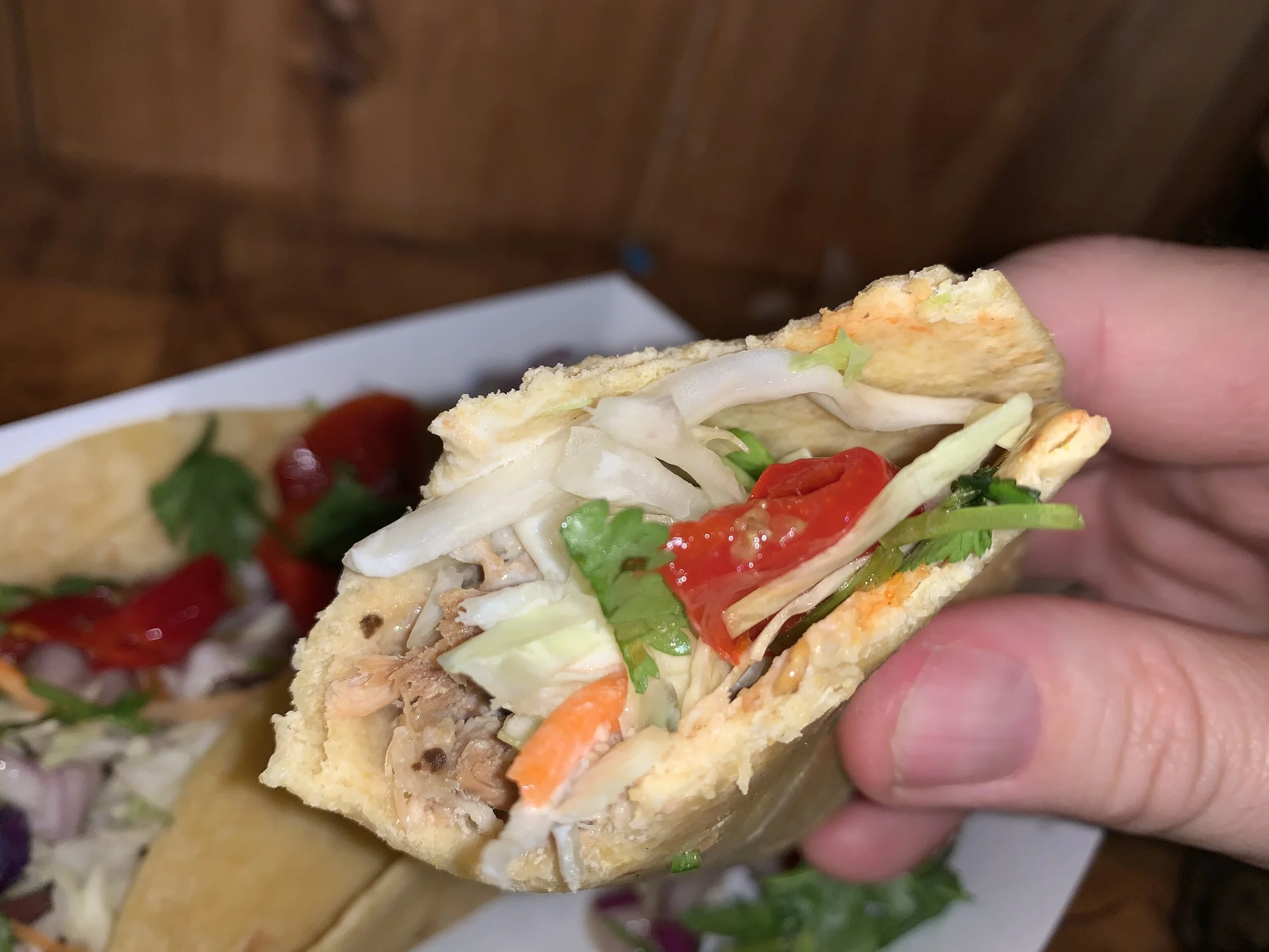  Yes, I had to get a shot of the taco interior…I mean I just had to capture what was causing the outrageously good taste. I think the pickled peppers and perfect, grilled chicken took this over the top. Image Courtesy: Dan Meyers 