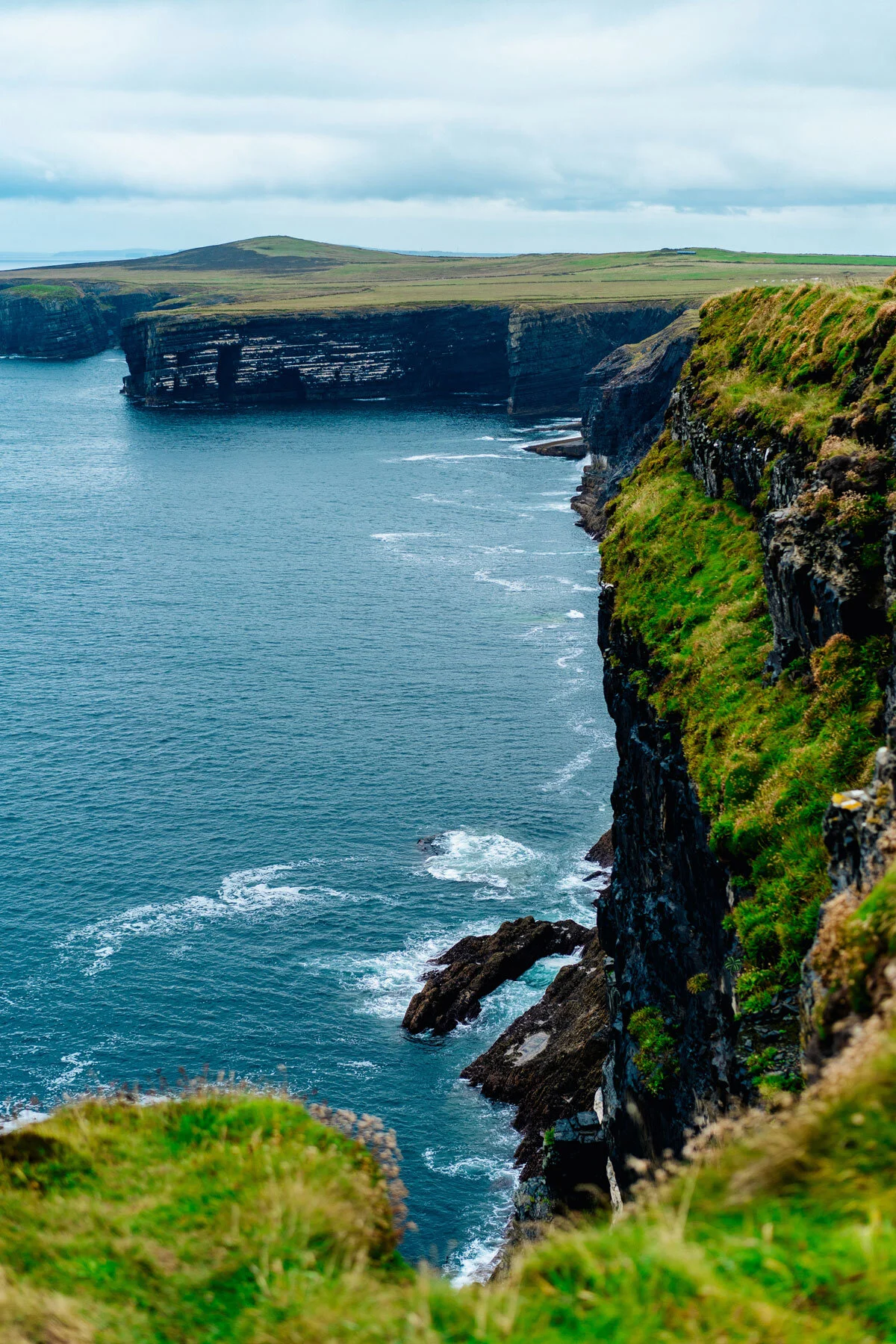  The coast of Ireland is downright stunning. Where in the world is that crazy four leaf clover however??? Image Courtesy: Dan Gold, Unsplash.com 