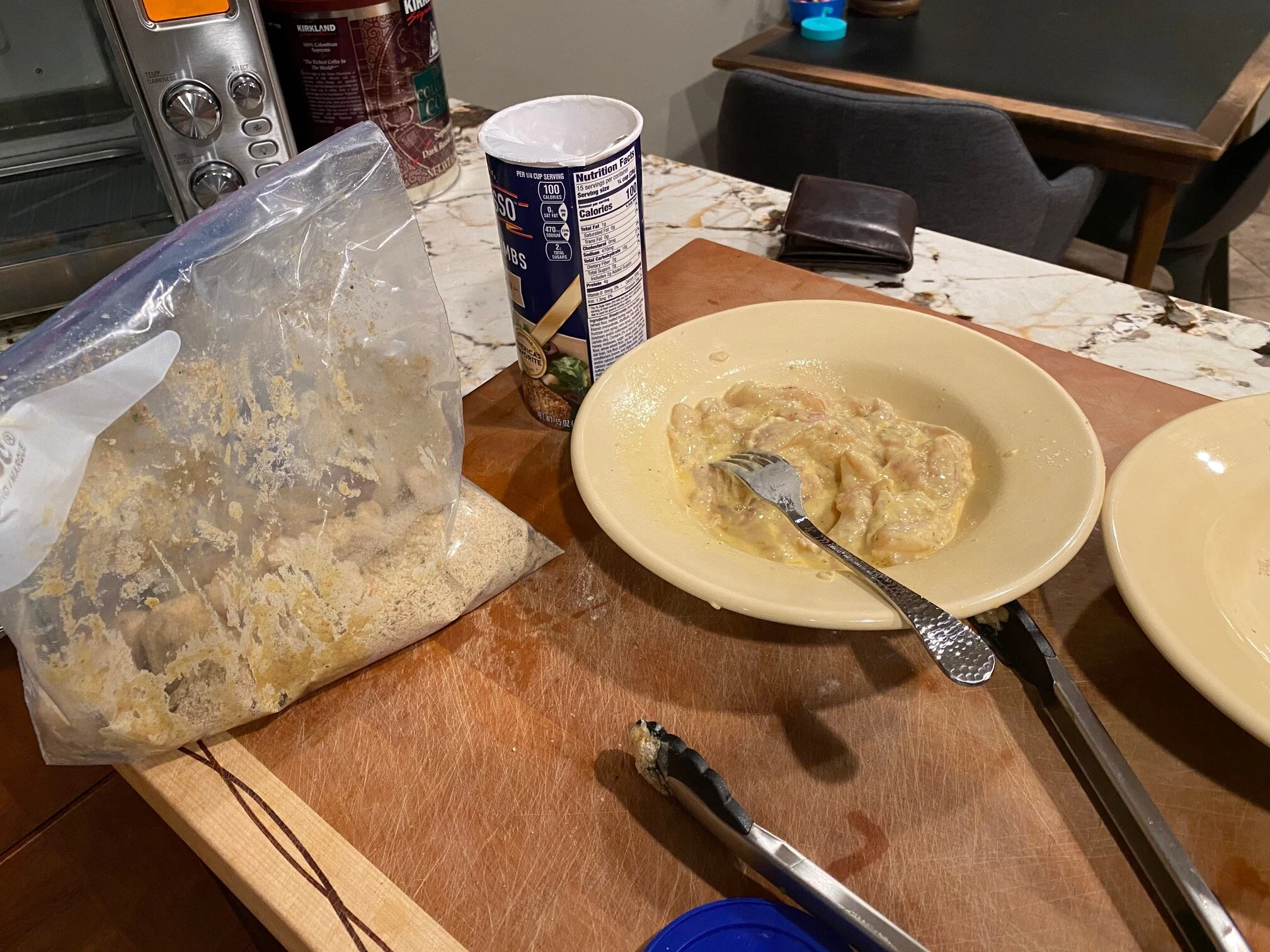 In this batch of chicken I began employing the Ziplock bag technique, which kept the mess way, way down from before. You can see here I’ve washed the chicken in the egg wash and am now coating the pieces in the panko bread crumb bag. However, my panko (in this case) is made of crushed Ritz crackers. Image Courtesy: Dan Meyers
