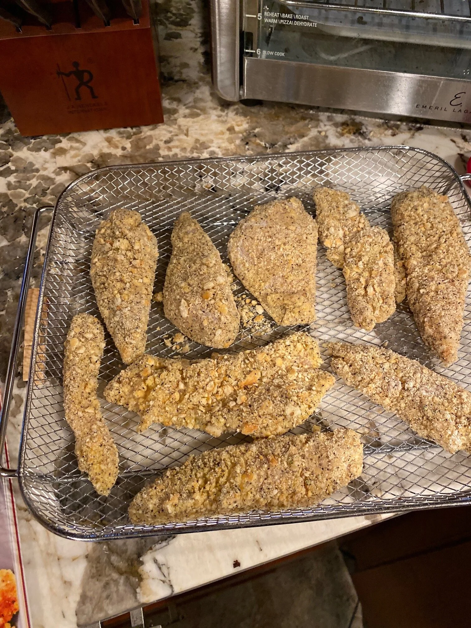 The chicken is prepped and loaded onto the cooking tray here. Time to air fry! Image Courtesy: Dan Meyers