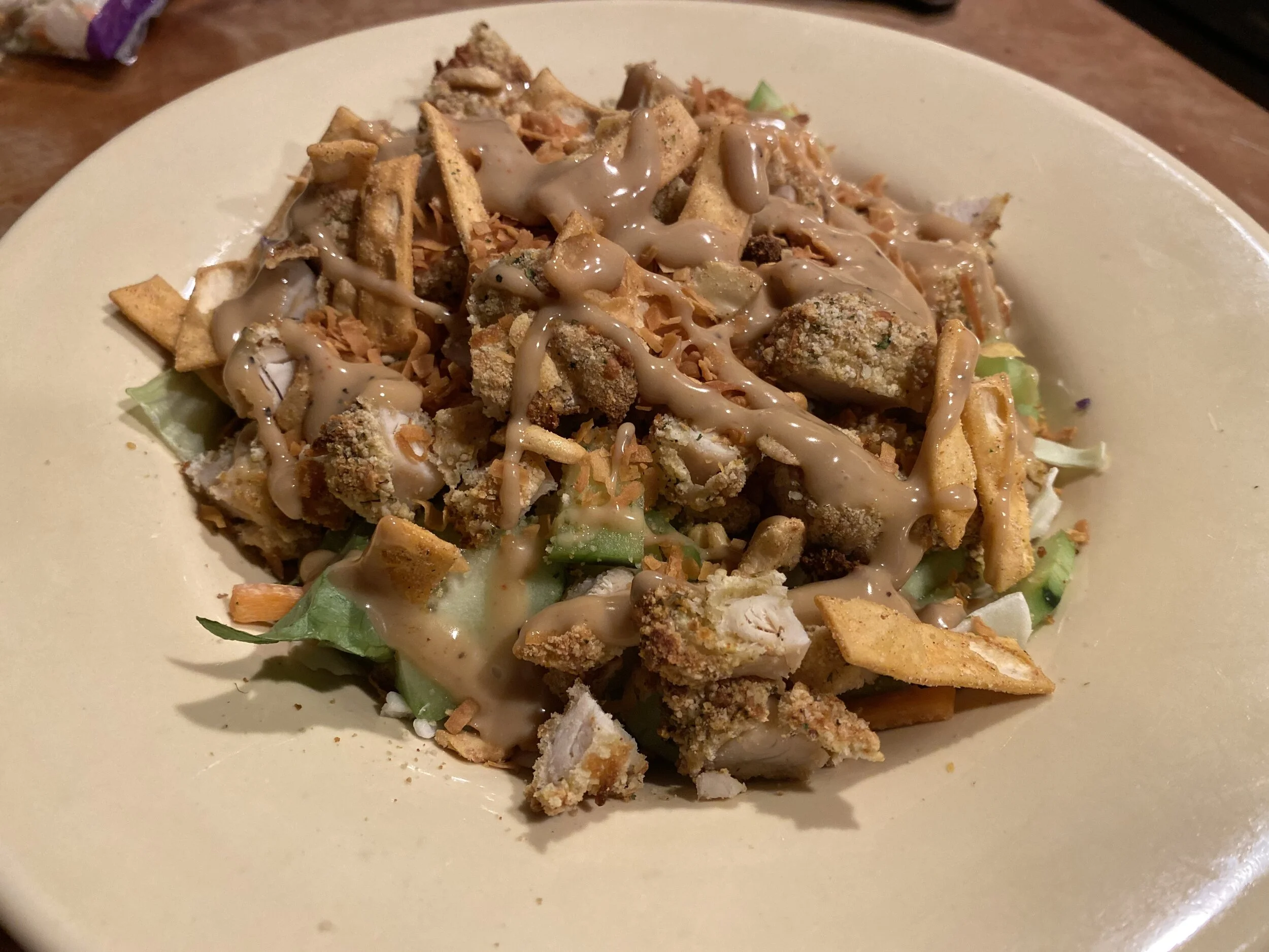 One of my favorite uses of my air-fried chicken is as a topping on a salad. Here I’ve made one of those pre-made salads (Thai Cashew here, a fave) and added the chicken. This is an awesome meal that clocks in at about 500 calories but tastes like 2000! Image Courtesy: Dan Meyers