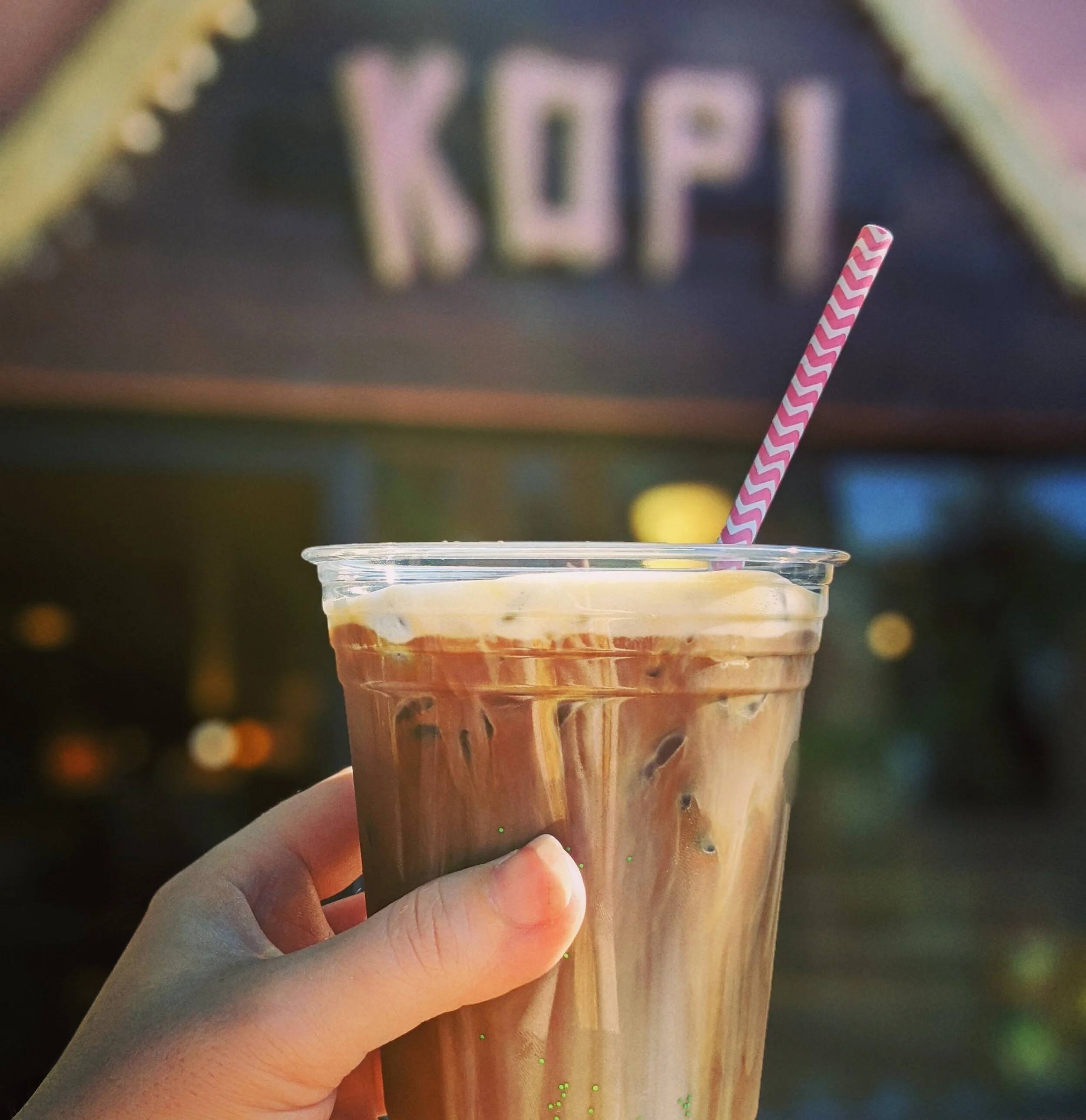 While I didn’t snap a picture of my excellent, iced latte, I did find an accurate image of this delectable drink on Kopi’s website. Thus, I’m sharing it here. And while little can be gleaned from the chocolate-colored liquid and ice you see here, let me tell you, it’s different and extremely good. Image Courtesy: Kopi Coffee House