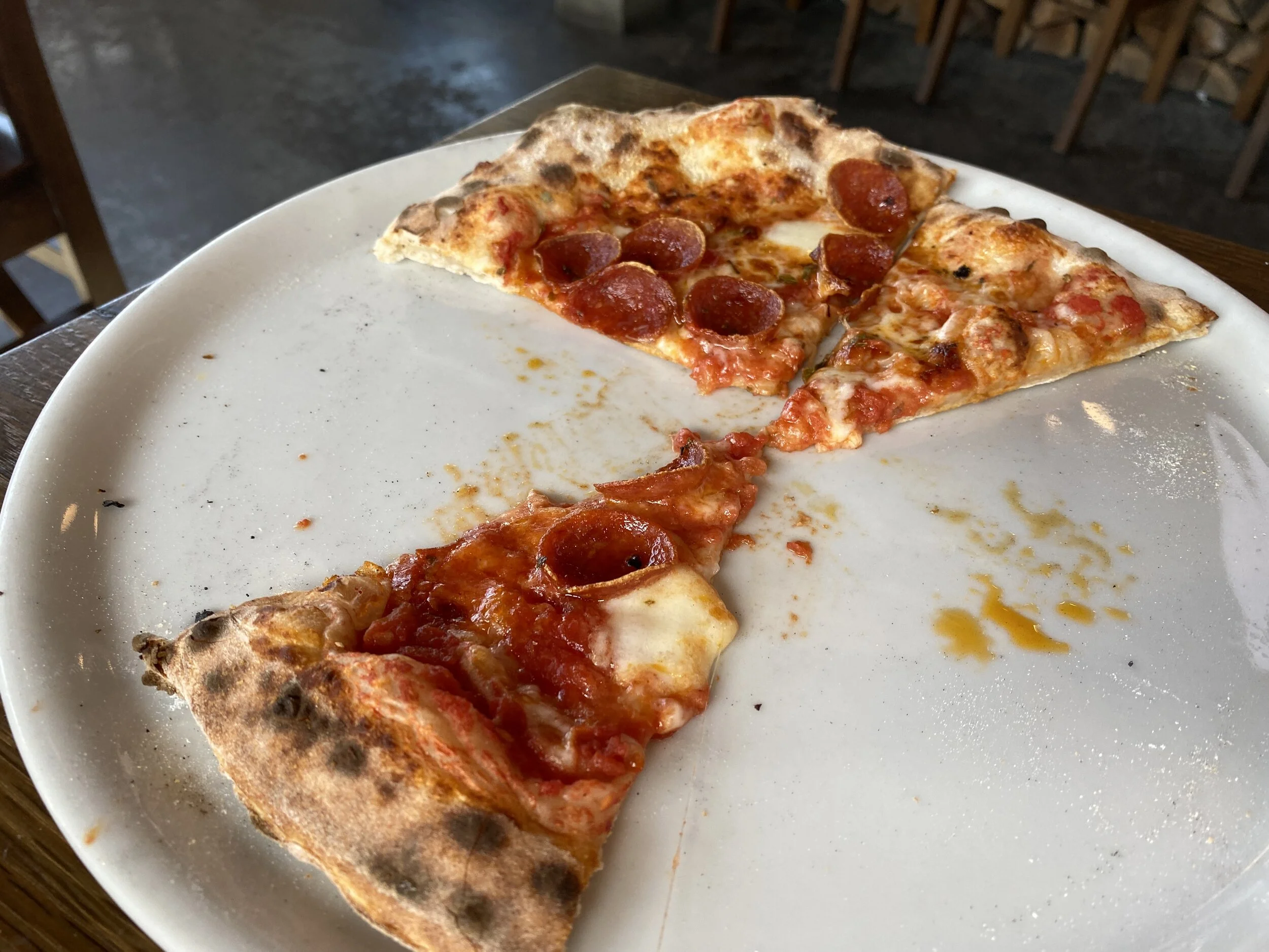 I was a bit remiss in not getting a picture of this wood-fired pizza before, well, eating a lot of it, but let’s just say I couldn’t hold back. So darn good. Image Courtesy: Dan Meyers