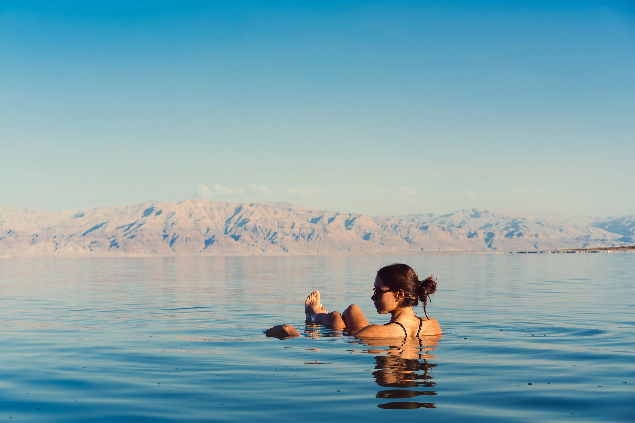  Swimming with contact lenses can increase your chances of an eye infection. If it’s a must, choose daily disposable lenses and throw them away after your swim. Prescription goggles are a far better solution allowing for the maintenance of clear vision without risking an eye infection. Image Courtesy: Envato Elements 