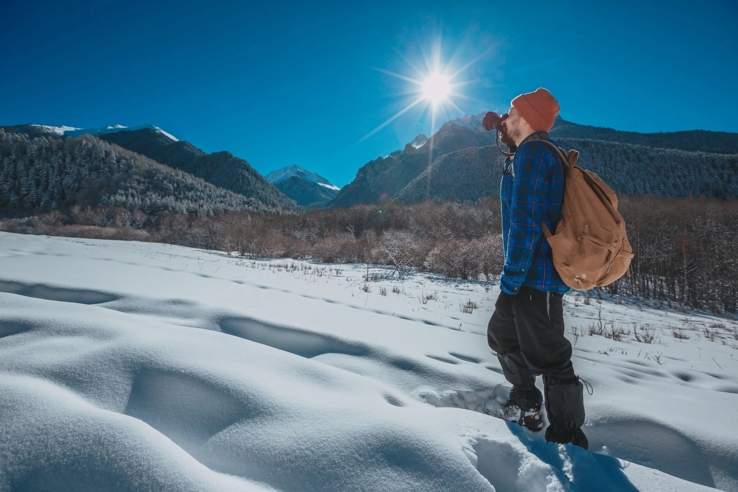  The winter sun can hit your eyes from above and below, reflecting off of snow, ice, and wet pavement. Be sure to wear your sunglasses and consider anti-reflection lenses. Image Courtesy: Envato Elements 