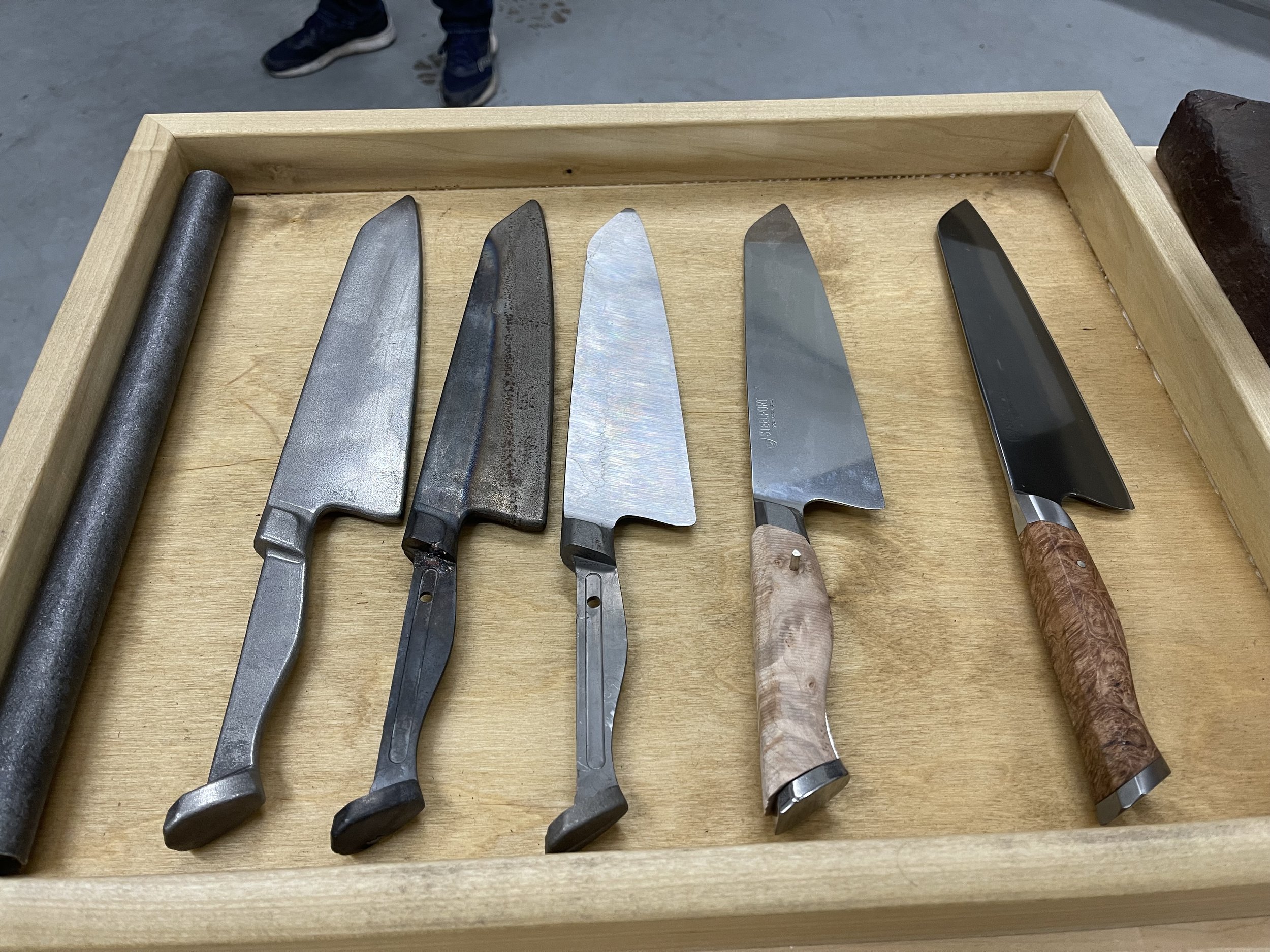  The five different stages of building a Steelport 8” Chef’s Knife. To handle each one of these at the factory was special. To own one of these knives? Above and beyond. Image: Dan Meyers 