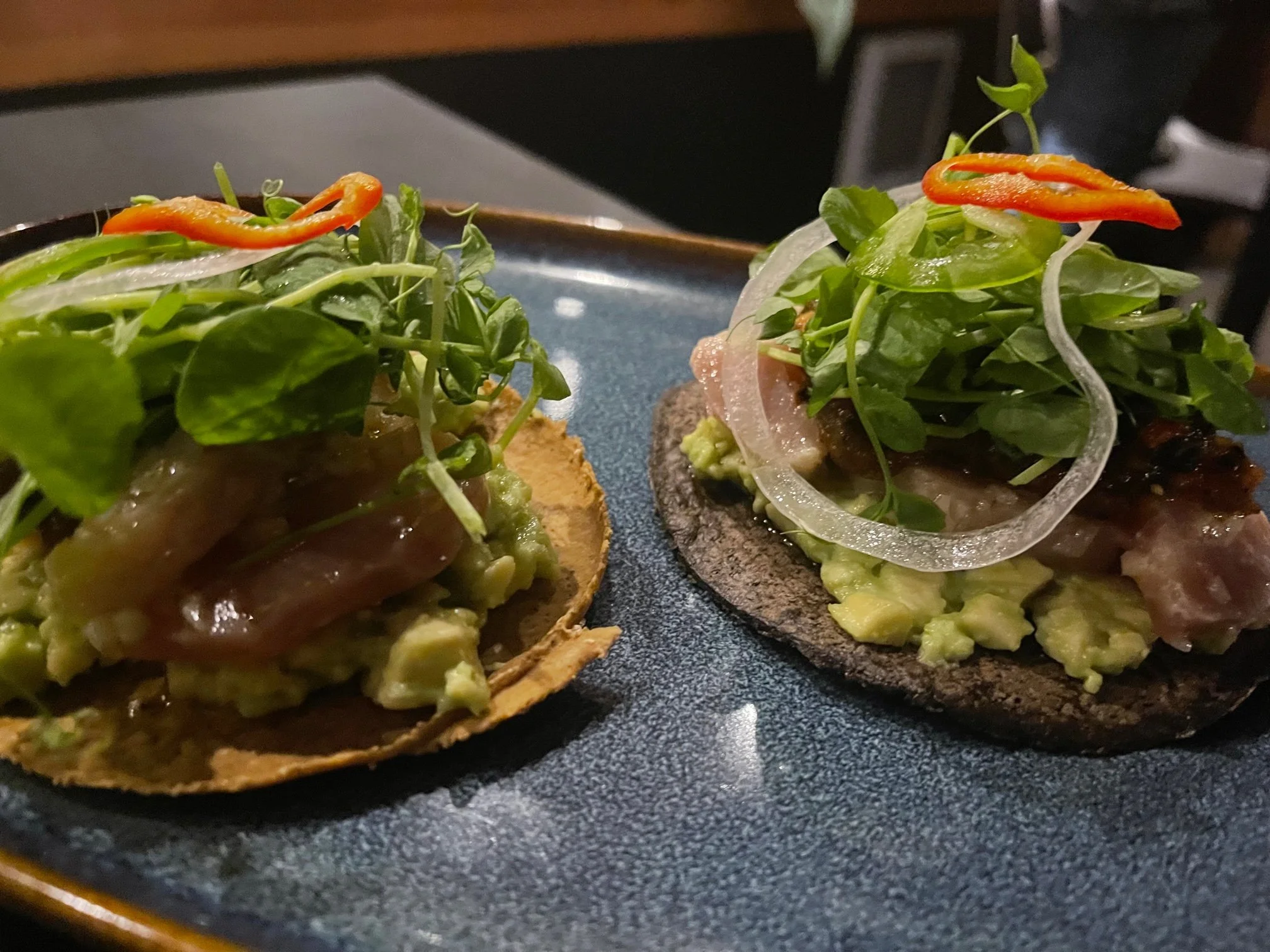 We ordered the entire tasting menu (recommended). This dish, Tostadas de Atun, was our favorite. Comprised of maiz, alabacore (tuna), salsa tatemada, and lime, well….it’s a must. Image: Dan Meyers
