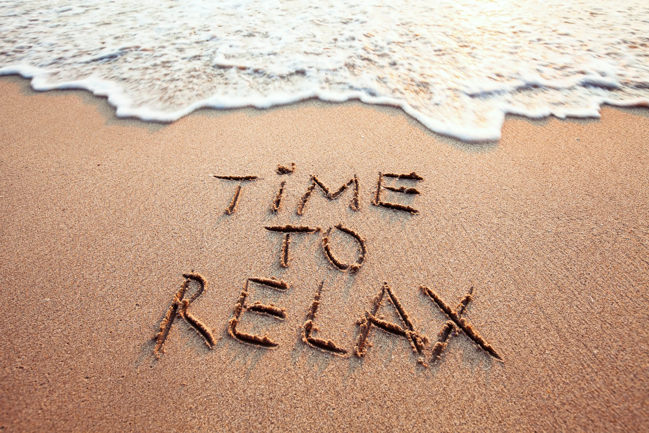 Beach-Message_in_Sand-Time_to_Relax.jpeg