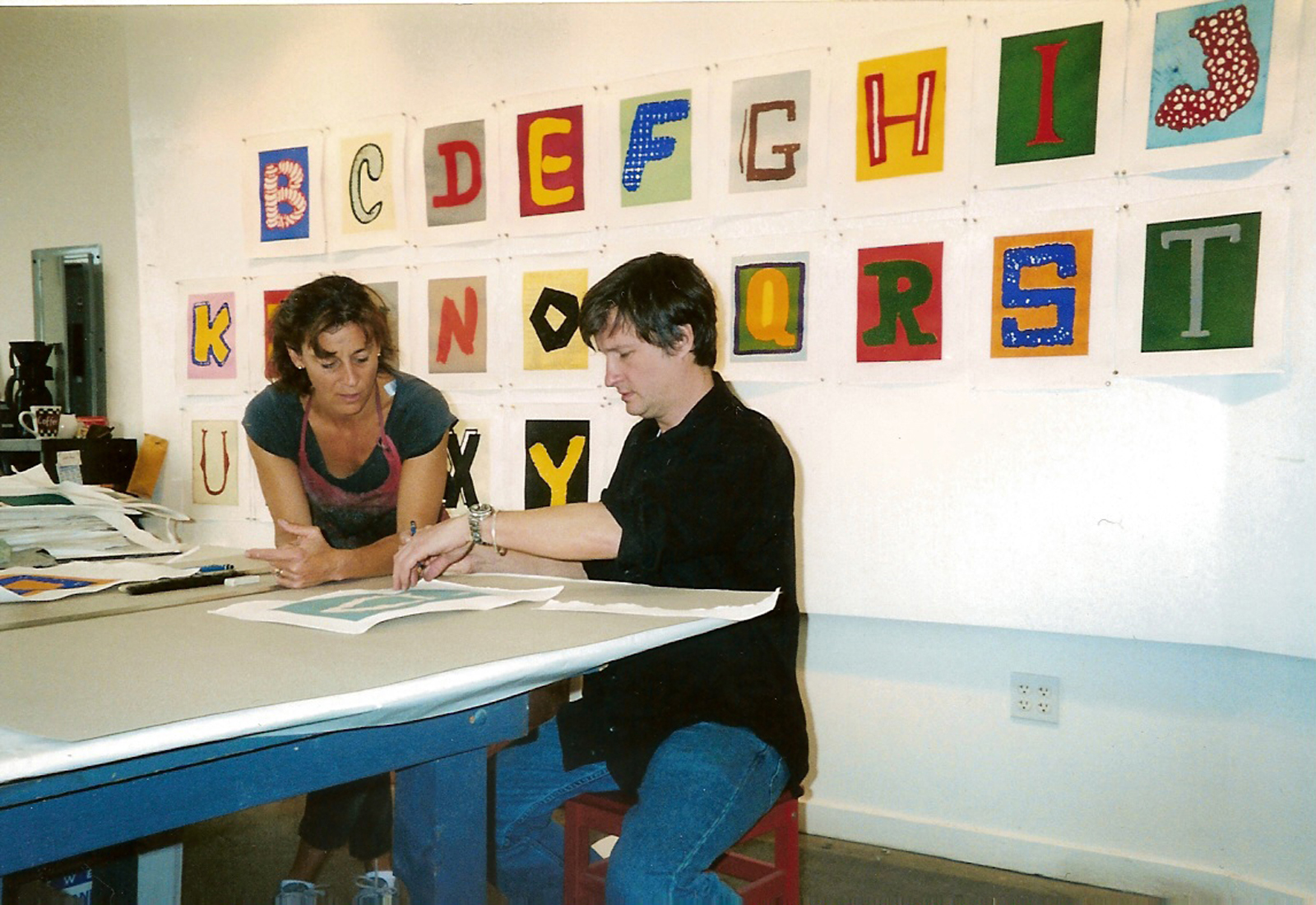 Renee Bott and Donald Baechler work in Paulson Bott Press Studio, Berkeley, CA 2003