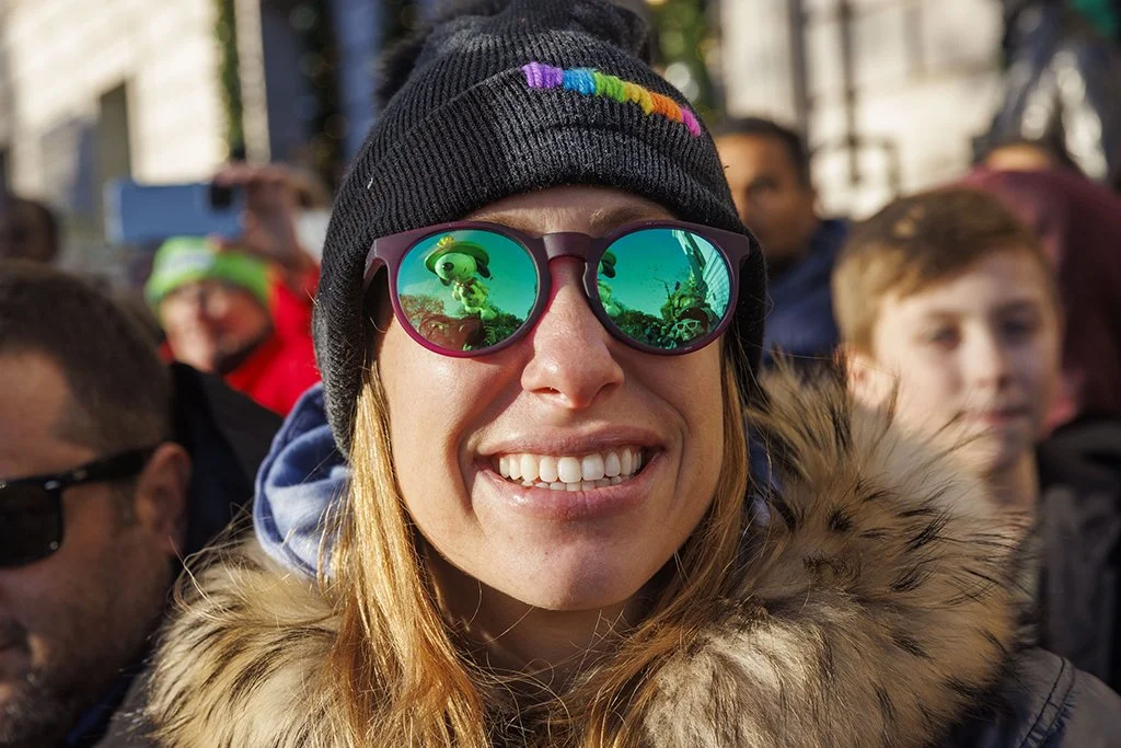  The Snoopy balloon is seen reflected in a spectator's sunglasses during the Macy's Thanksgiving Day Parade in New York, New York, USA, 23 November 2023. 
