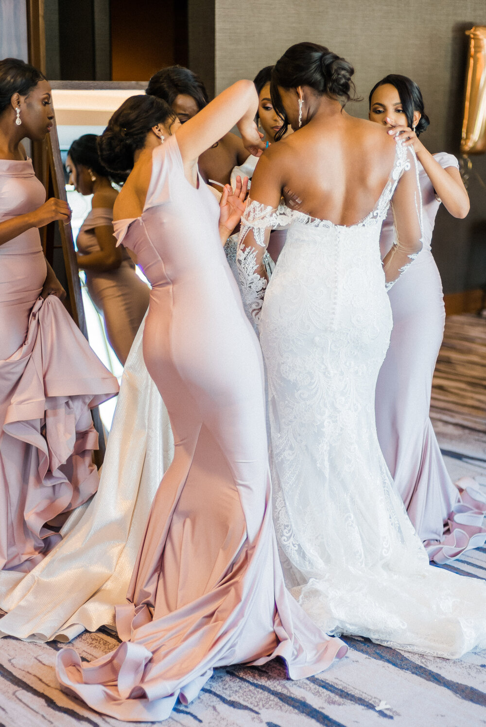 African American Bridesmaids attend Bride 