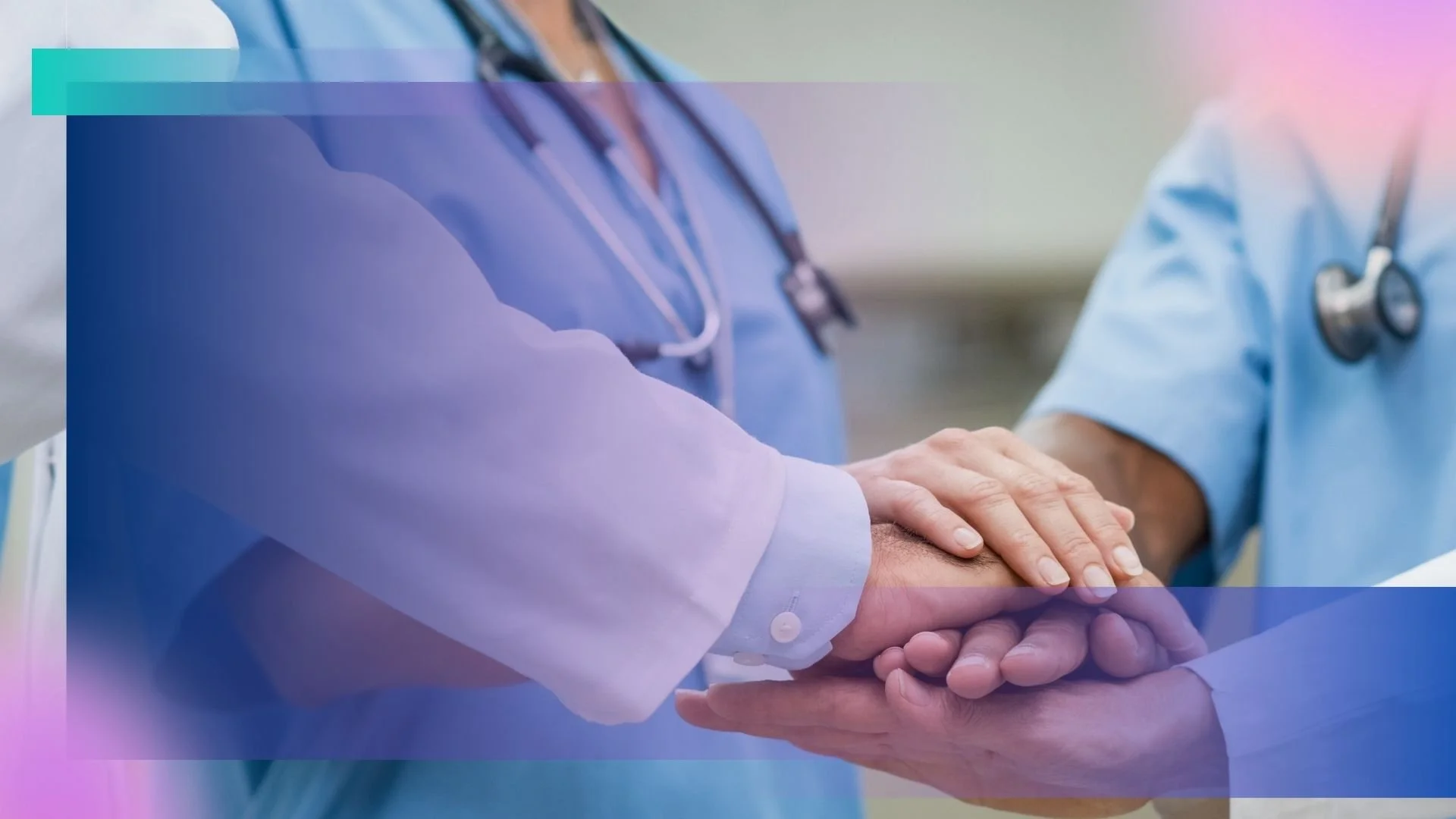Doctors putting hands together in a sign of teamwork