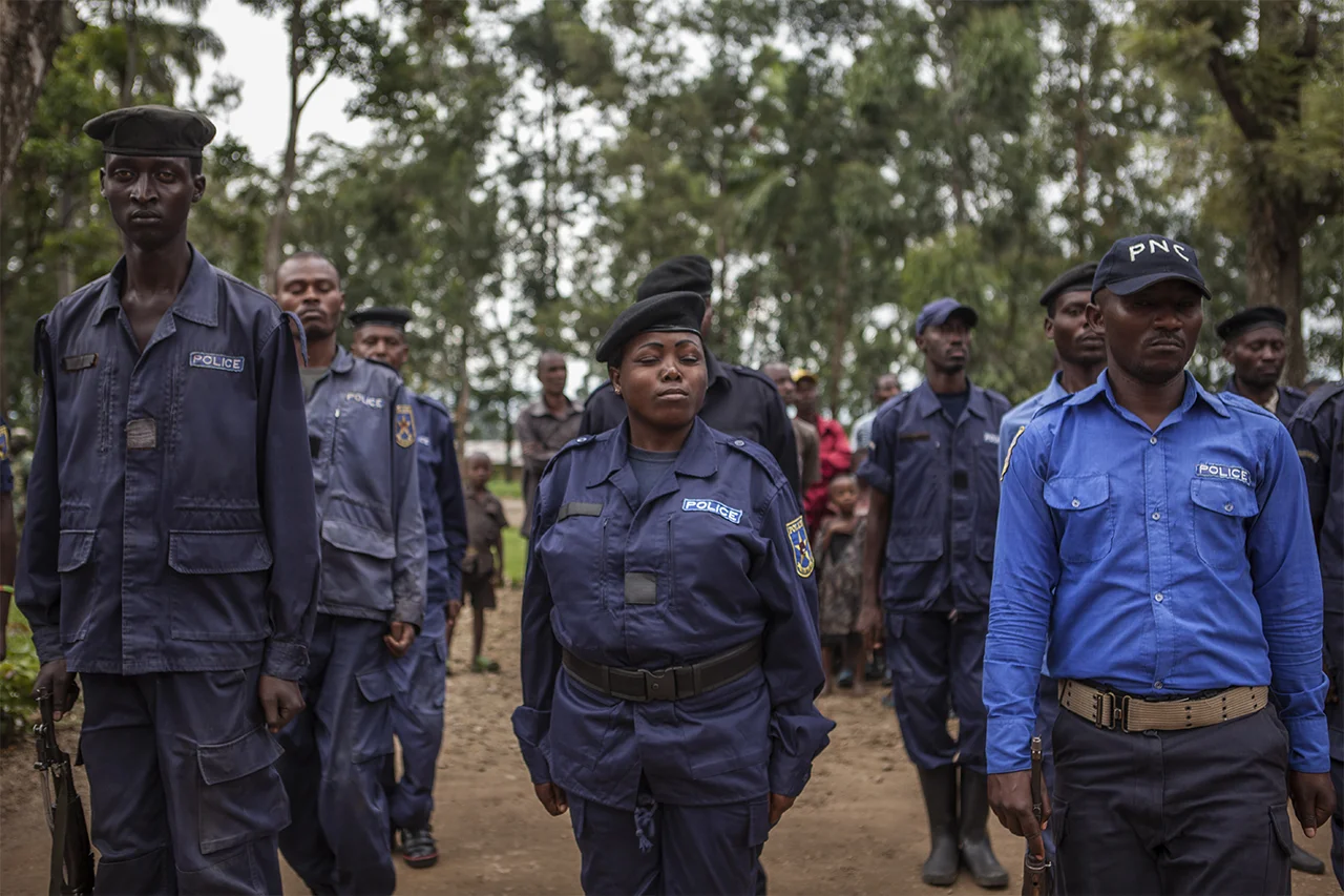 Major Mathilde Samba, 31 years old, during a M23 police show. Mathilde has been in the Congolese army for 17 years. She defected in November 2012, joining M23 with her husband and sending her daughters to Kinshasa. Rutshuru, North Kivu, DRC