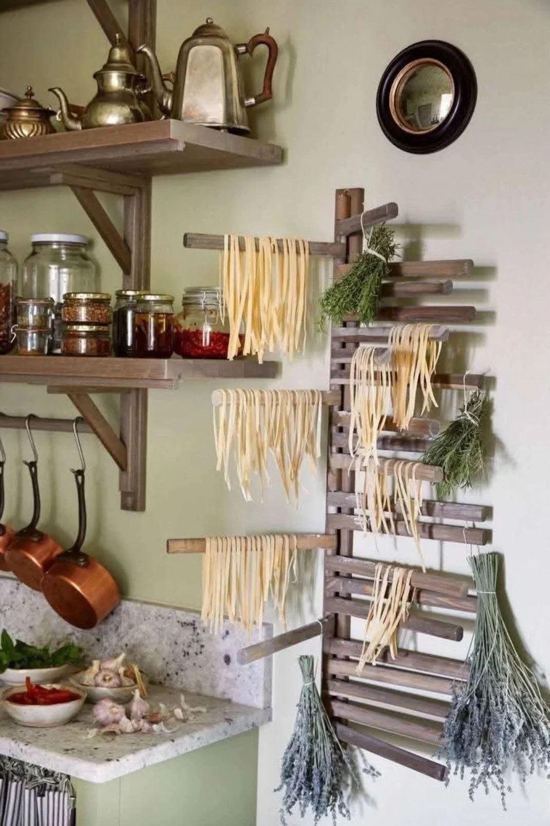 Making and drying pasta in an old and beautiful, filled with life kitchen in Tuscany or Provence
