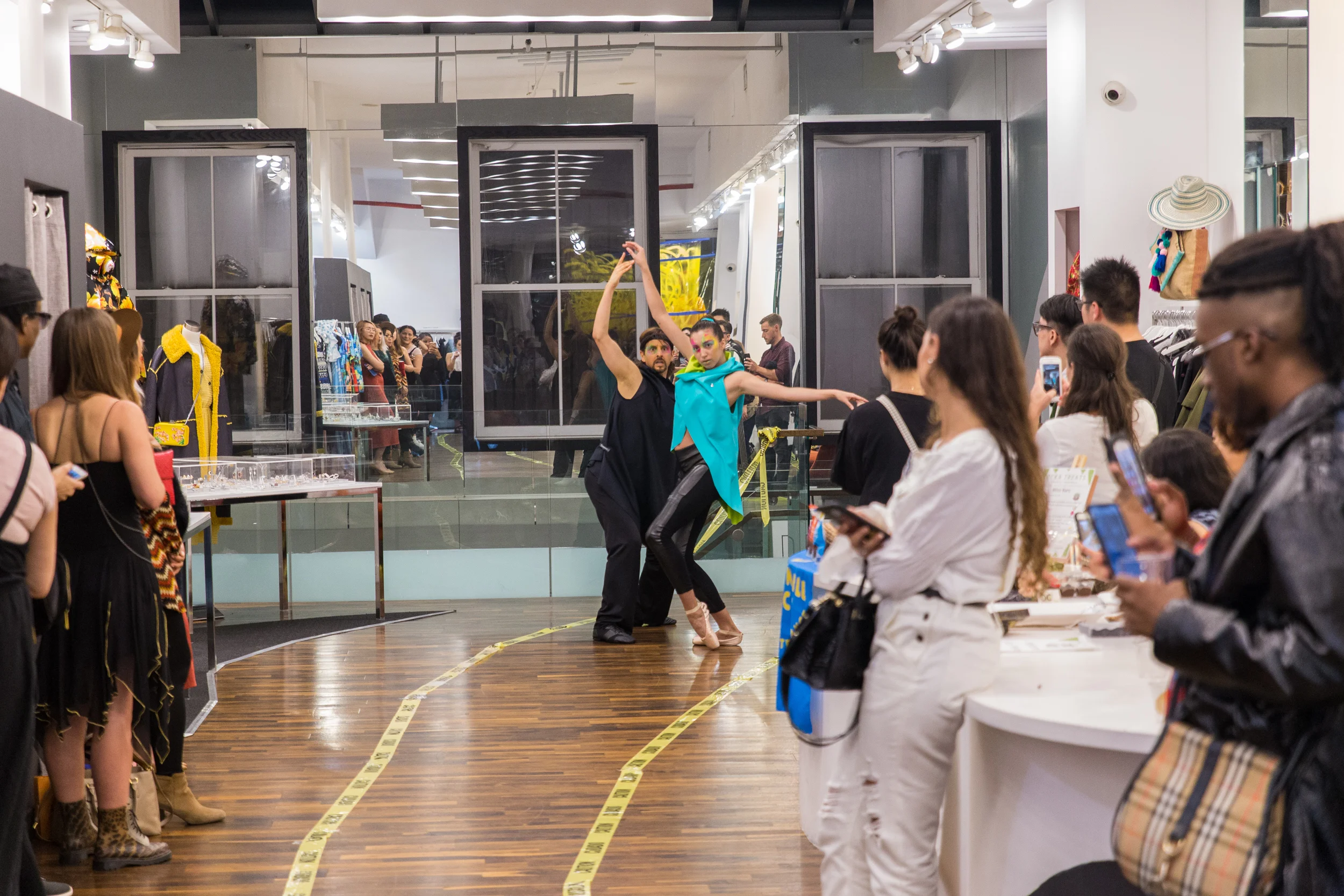A theatrical dance amidst the fashion show.