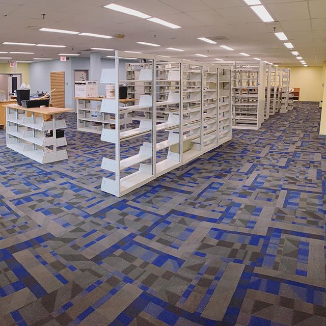 Another day, another library project complete! 📚 Yesterday our crew completed a library at a local college using @shawcontract carpet tiles, and wow - what a fun style they selected! We love the look of this space and hope the students do as well! ?