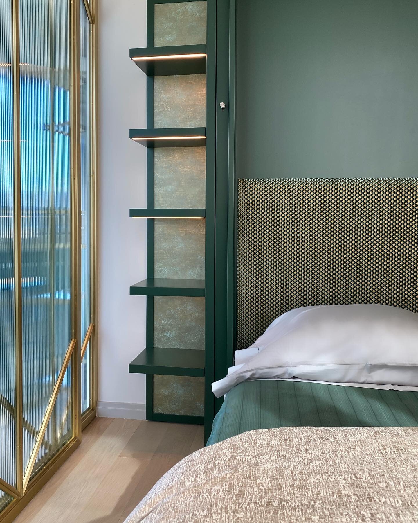 💚Green &amp; Gold!💛 I love that every room of this project has its own color story. On the other side of the custom brass doors is the 3rd bedroom that doubles as an office. The murphy bed was further customized by my carpenter to include the rich 