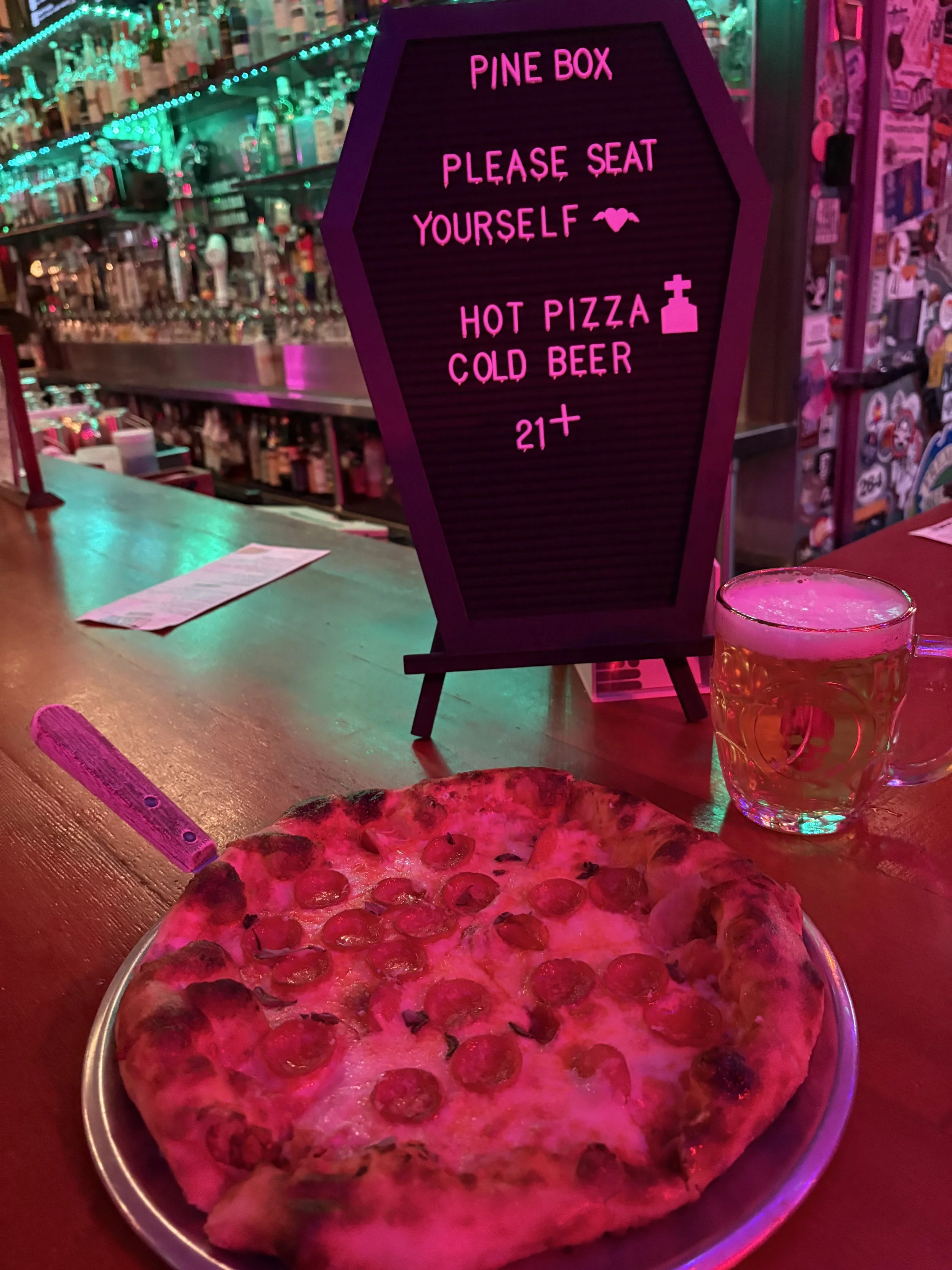 Coffin sign & pizza pic.JPG