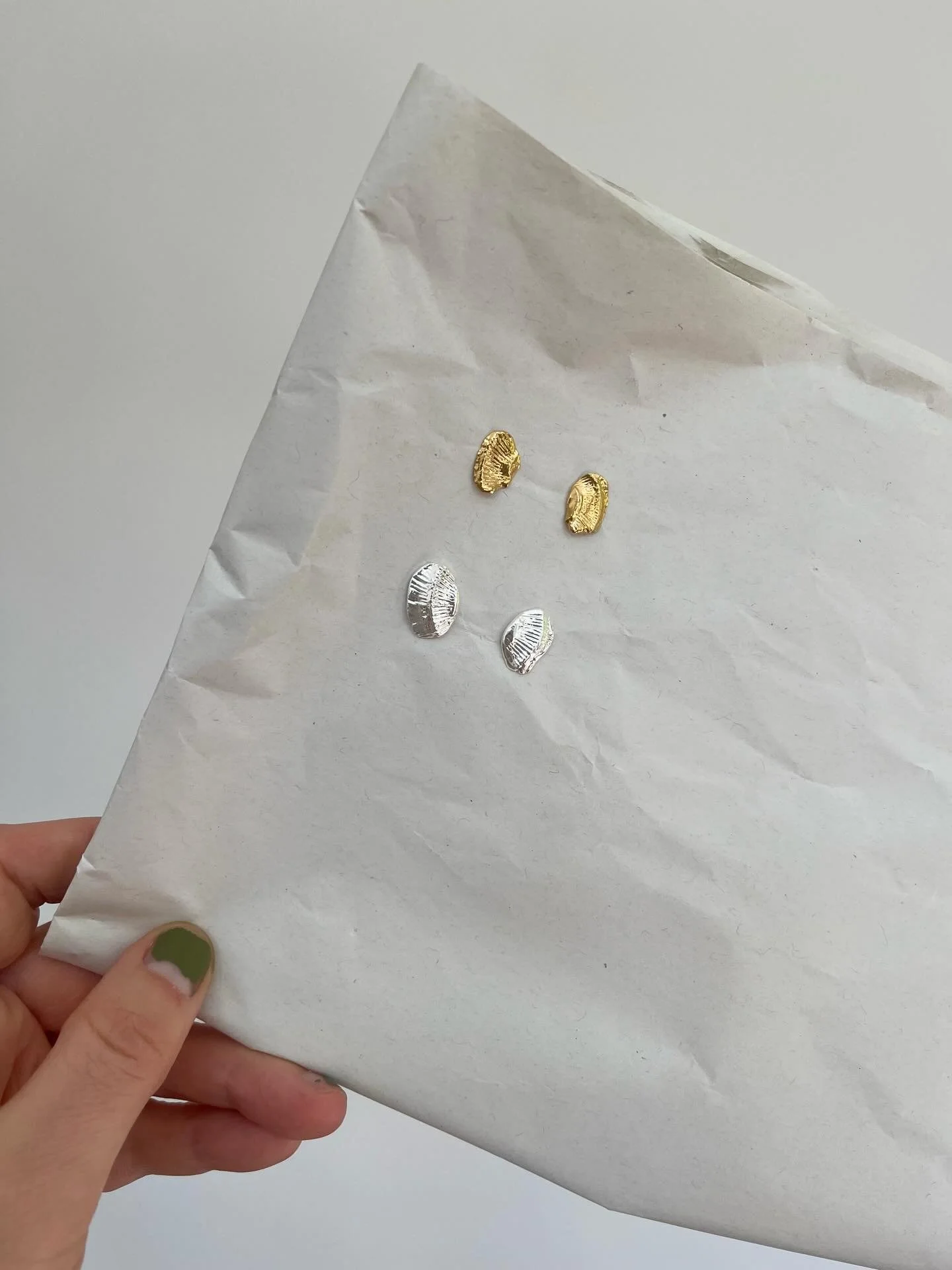 One-of-a-kind fossil stud earrings just listed in the shop&hellip;formed by moulding silver clay to fossils the kids found at Robin Hoods Bay.