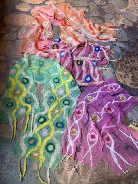 felted scarves on floor.jpeg