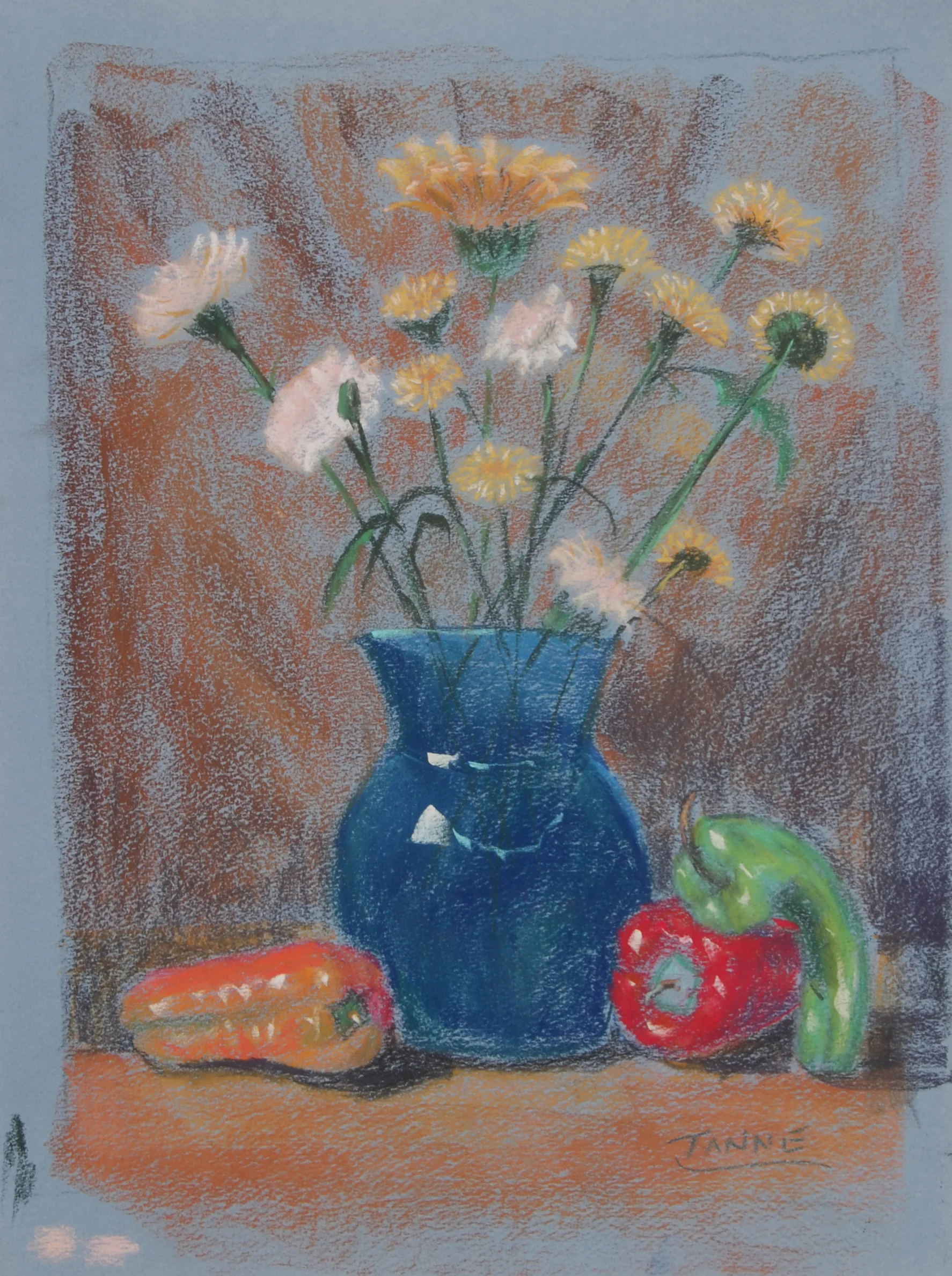 Image #0043: White and yellow flowers in a blue glass vase. Orange, red and green peppers on the sides 