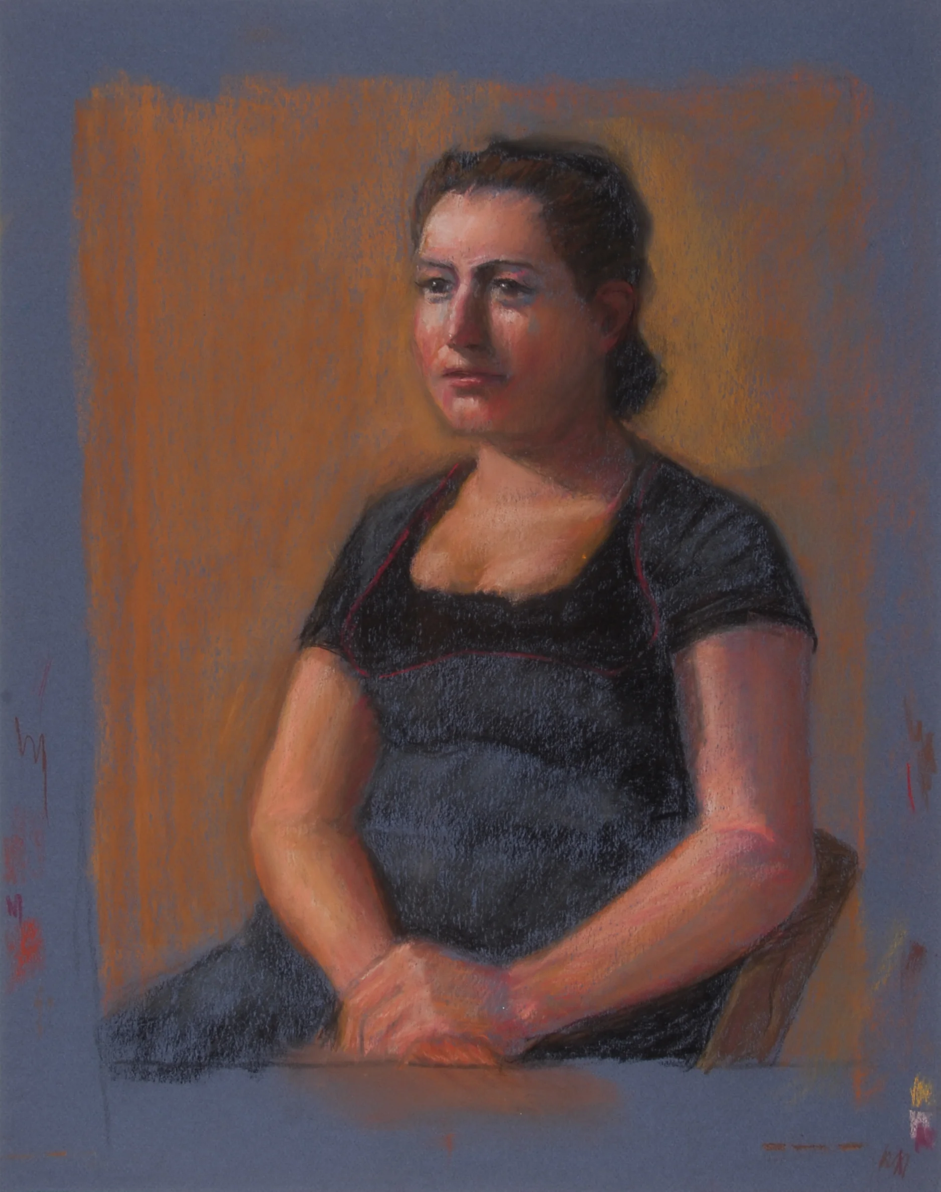 Image #0090: Woman sitting in chair, gray dress, hands folded, blue and orange background