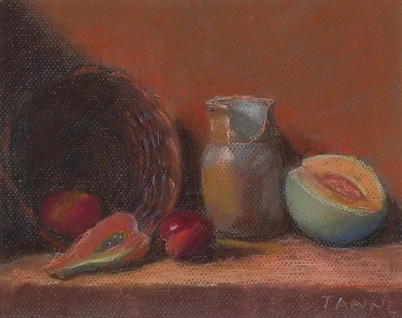 Image #0278: Basket with fruit in front on a table with a brown chipped jar on the right