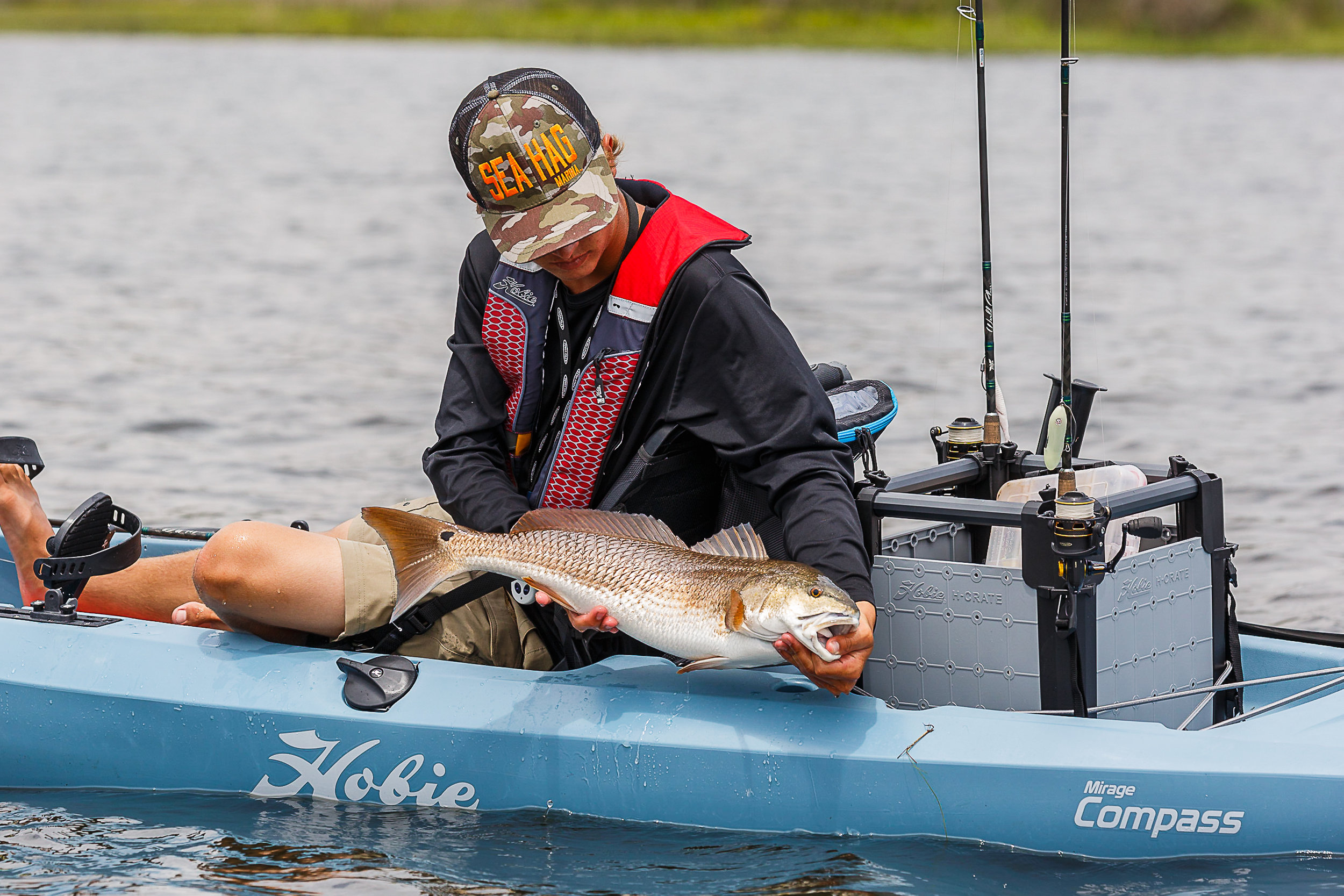 Compass_action_fish_redfish_male_headshot_lookingdown.jpg