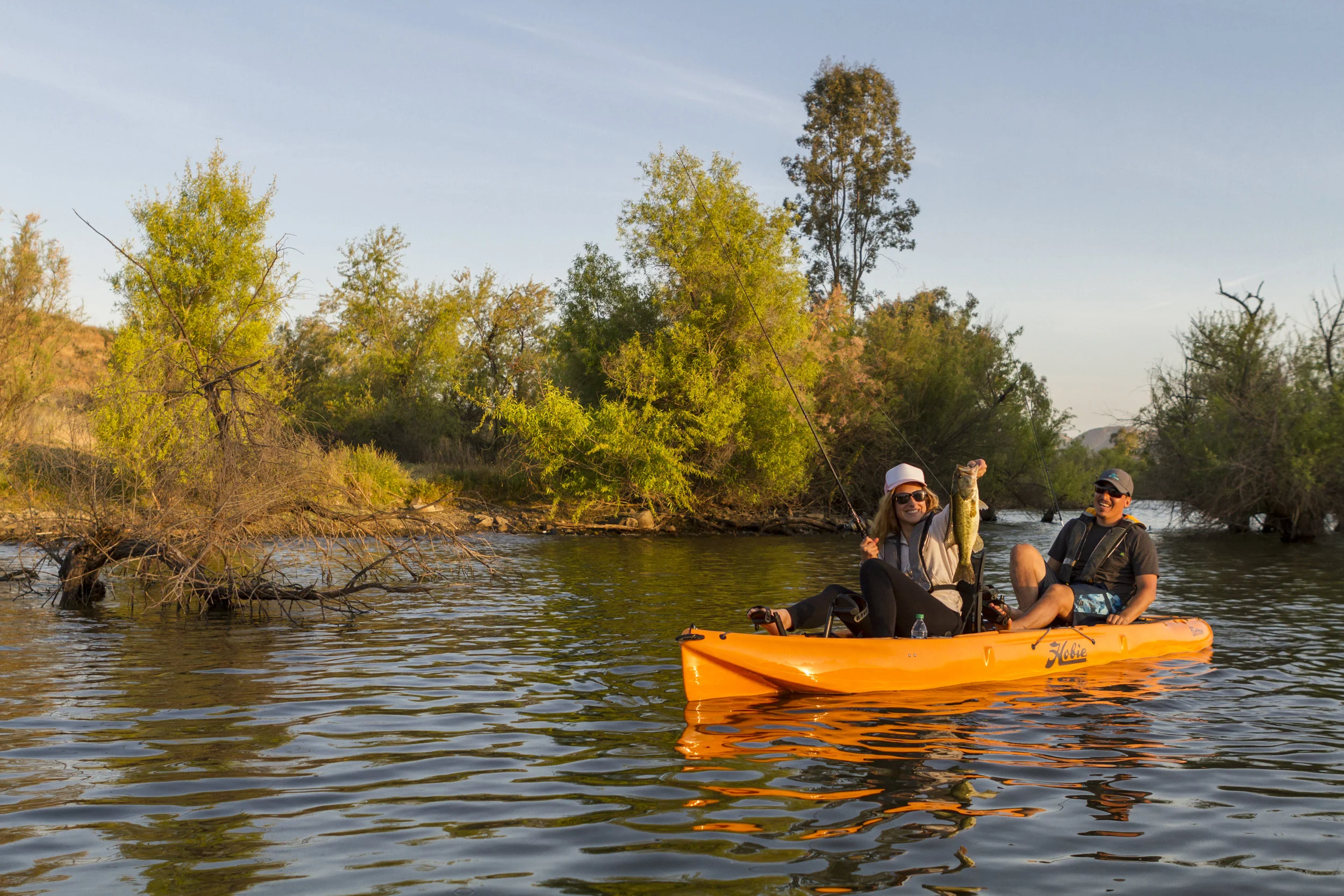 Outfitter_action_fishing_bass_papaya_couple_Kevin_Grechen.jpg