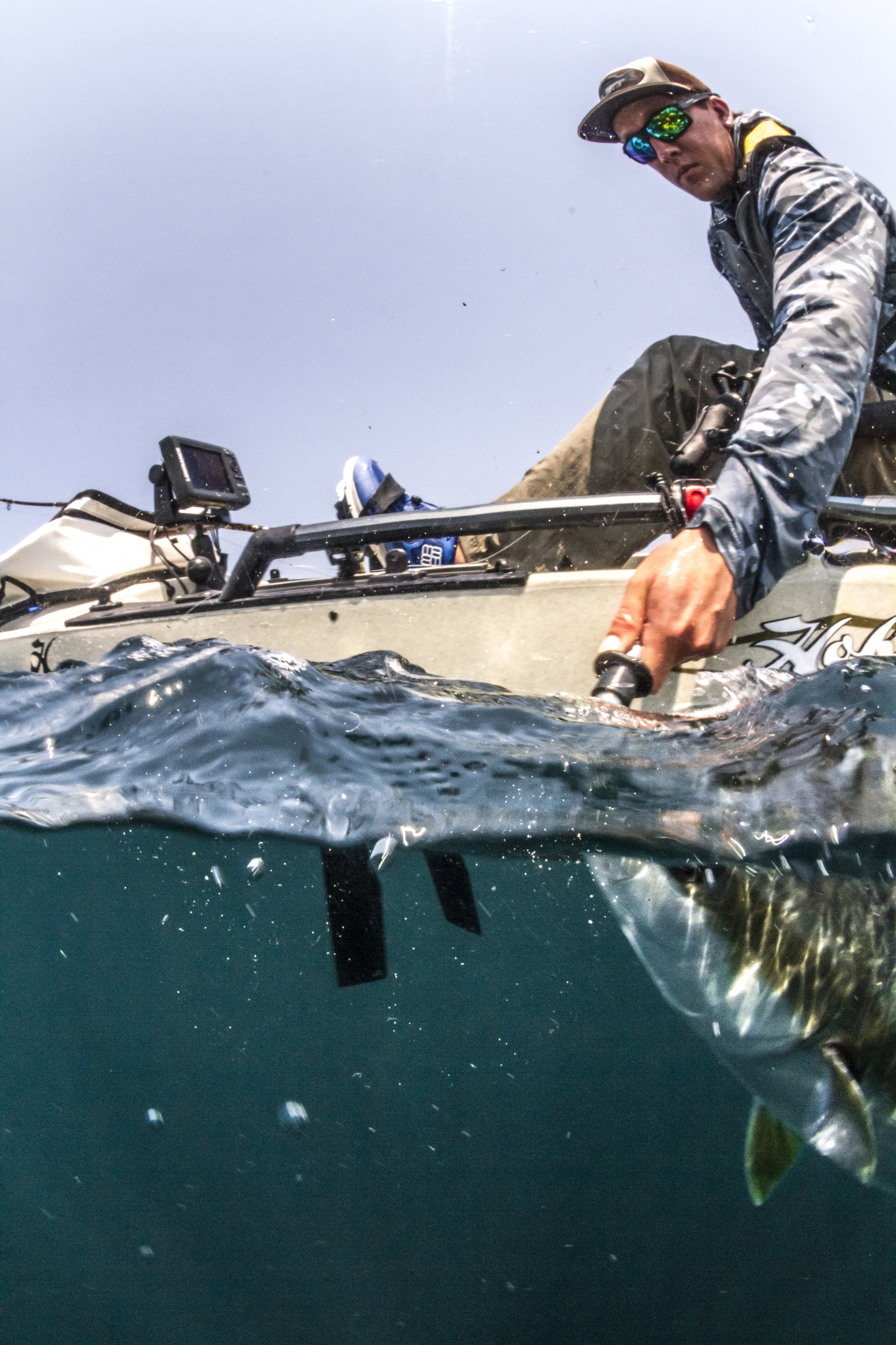 ProAngler14-action-fishing-overUnder-MD180-yellowtail-4408-full.jpg