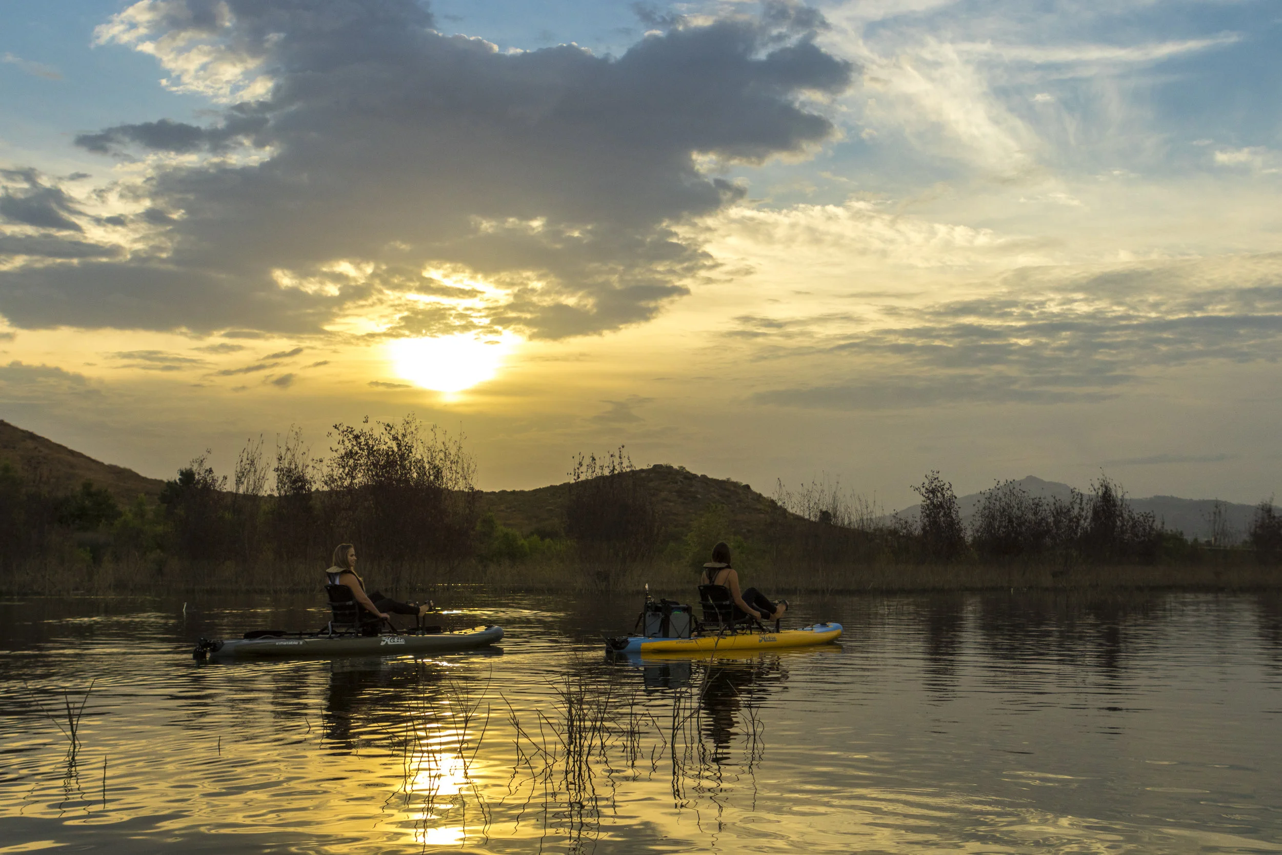 i11S_action_sunrise_females_twoboats_olive_mango_trees.jpg