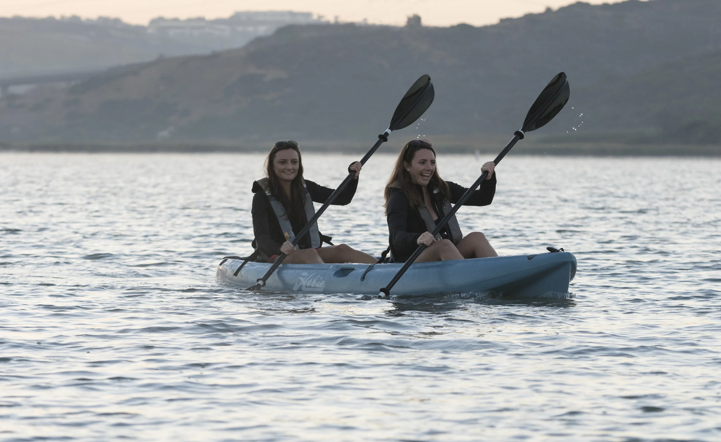 Kona_action_slate_females_laughing.jpg