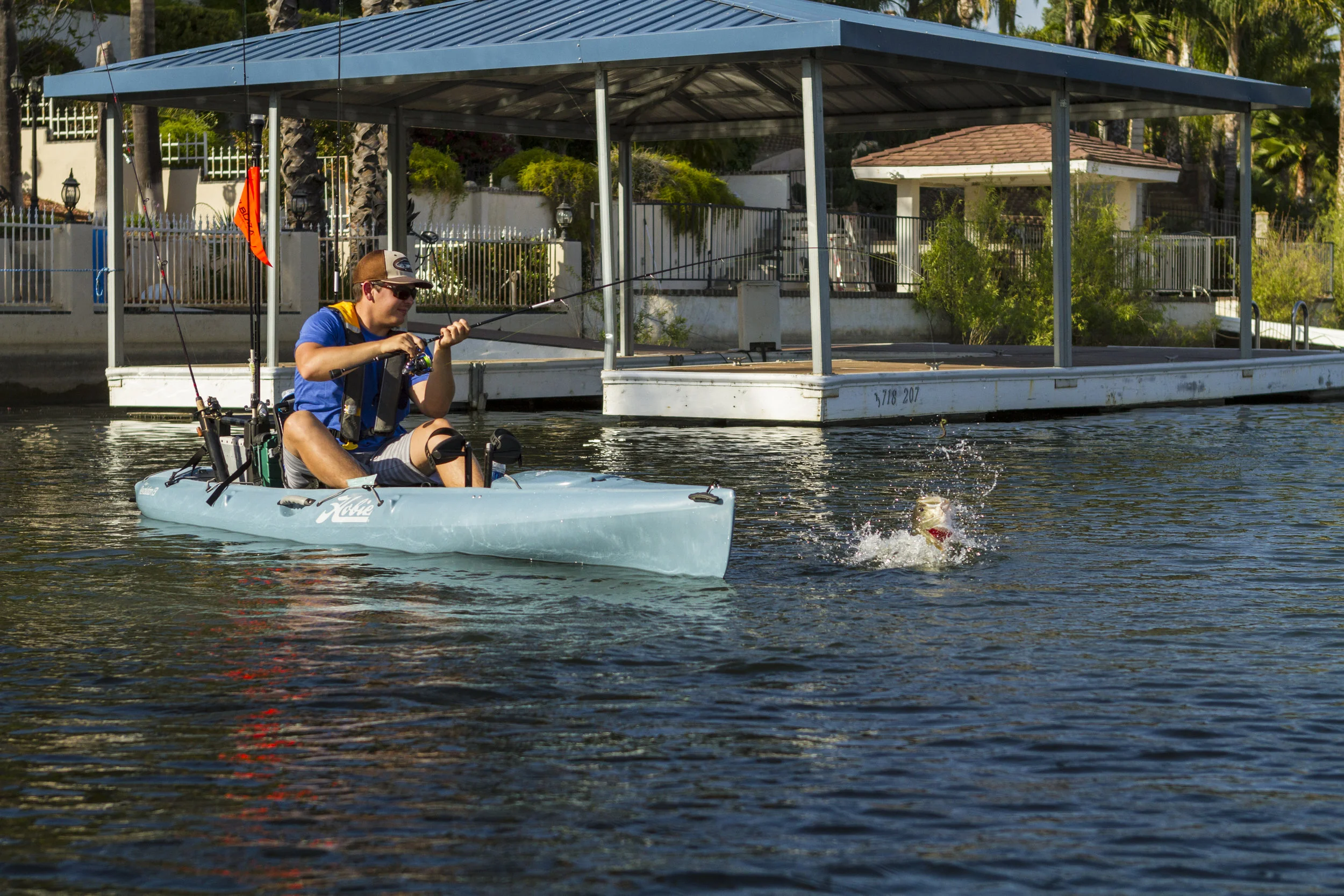 Revolution13_action_fishing_bass_fighting_slate_Sam_docks_lake.jpg