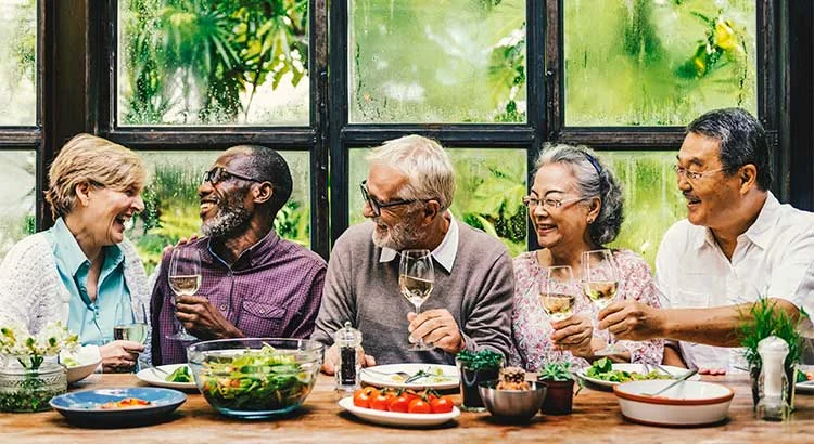 Old people eating together