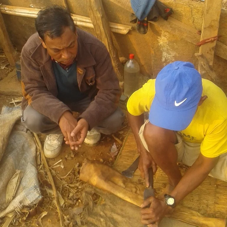 Impurities are scrapped away by hand