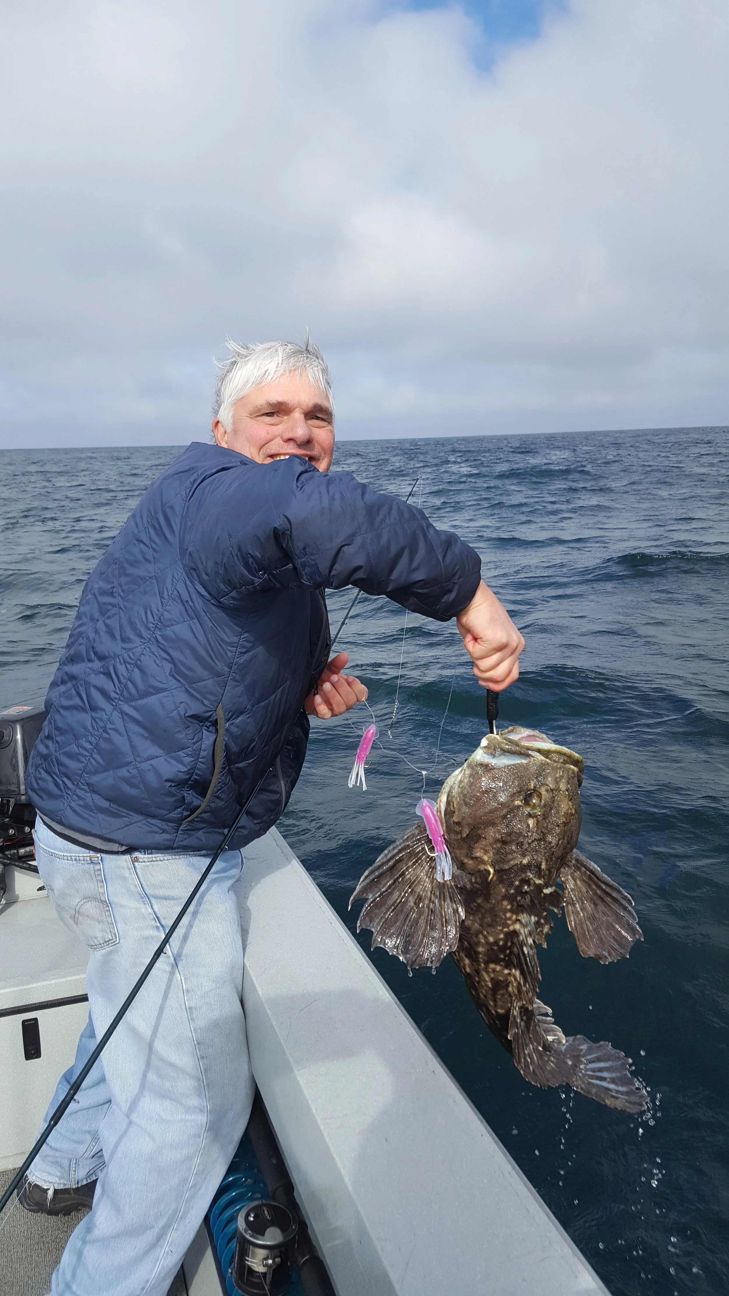 "quick picture taken before releasing a large cabezon"