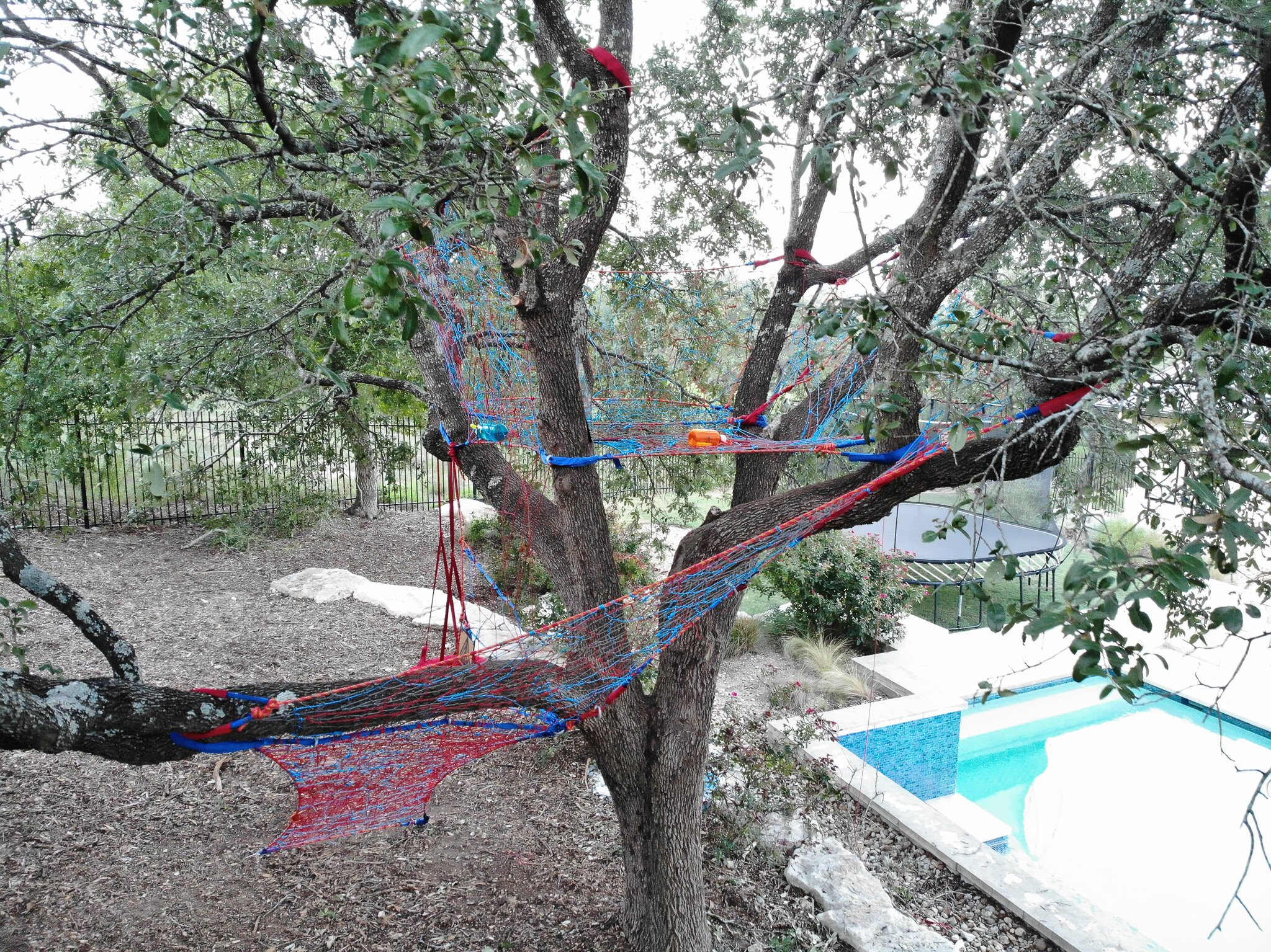  This Tree Weave installation is in Light Blue, Scarlett and Grey. 