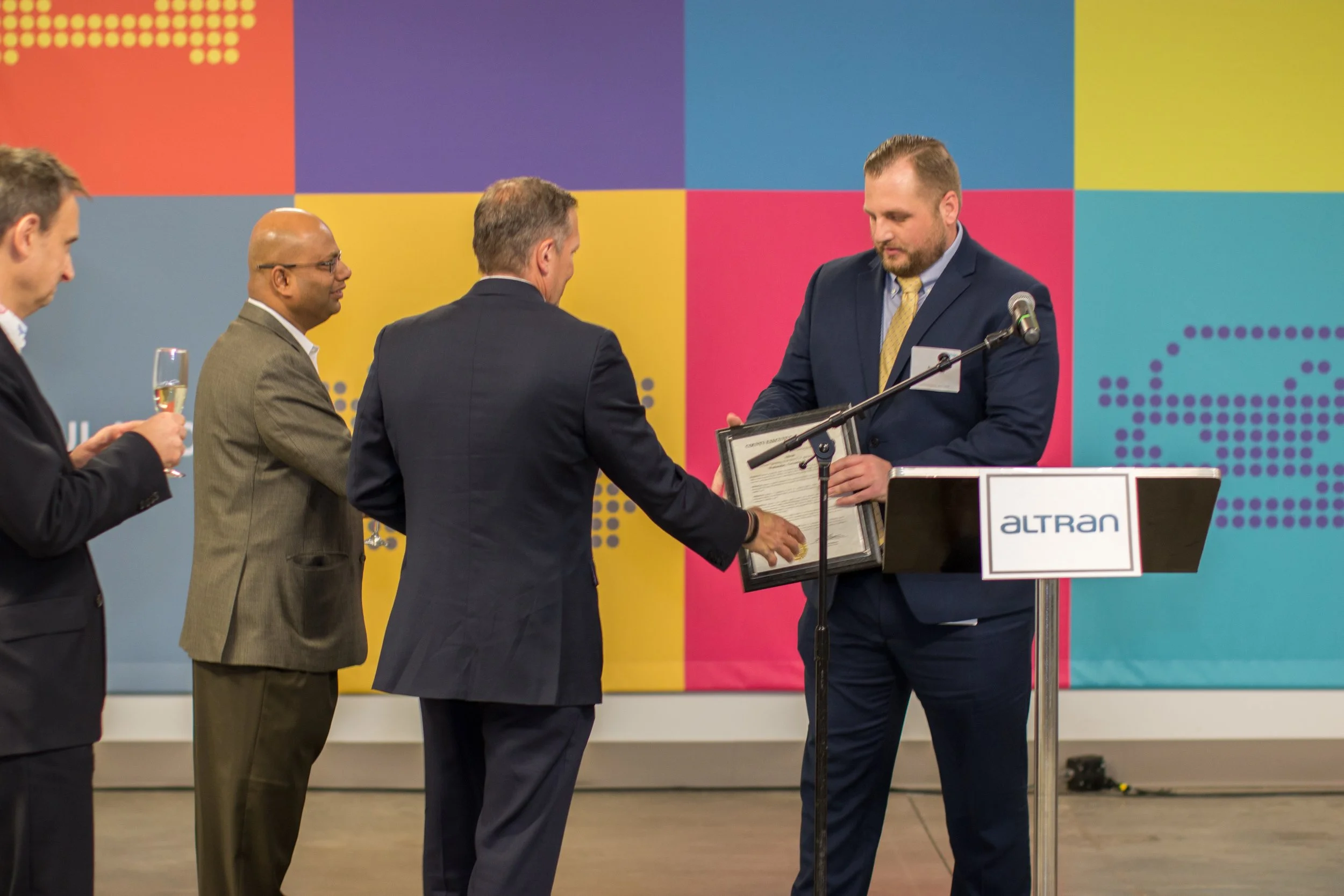 Ryan Cram, Oakland County presenting plaque to Altran