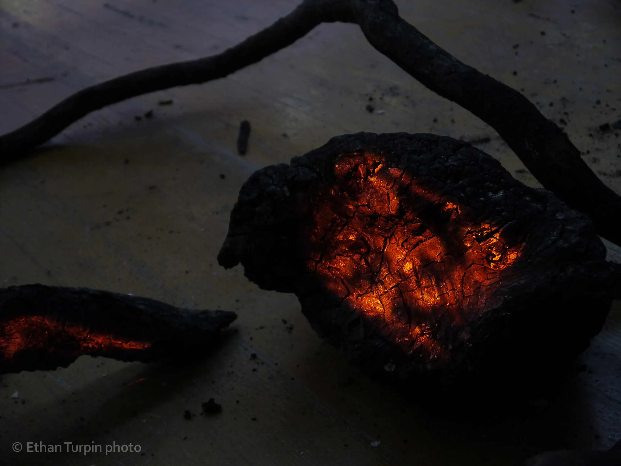 Visitors encountering the glowing “Embers” often reach to check for heat. To add an uncanny element to “Walk Into Wildfire” at a US Forest Service exhibit in Vallejo, CA, Ethan Turpin and Jonathan PJ Smith arranged burnt branches and carefully mapped video onto their surfaces.