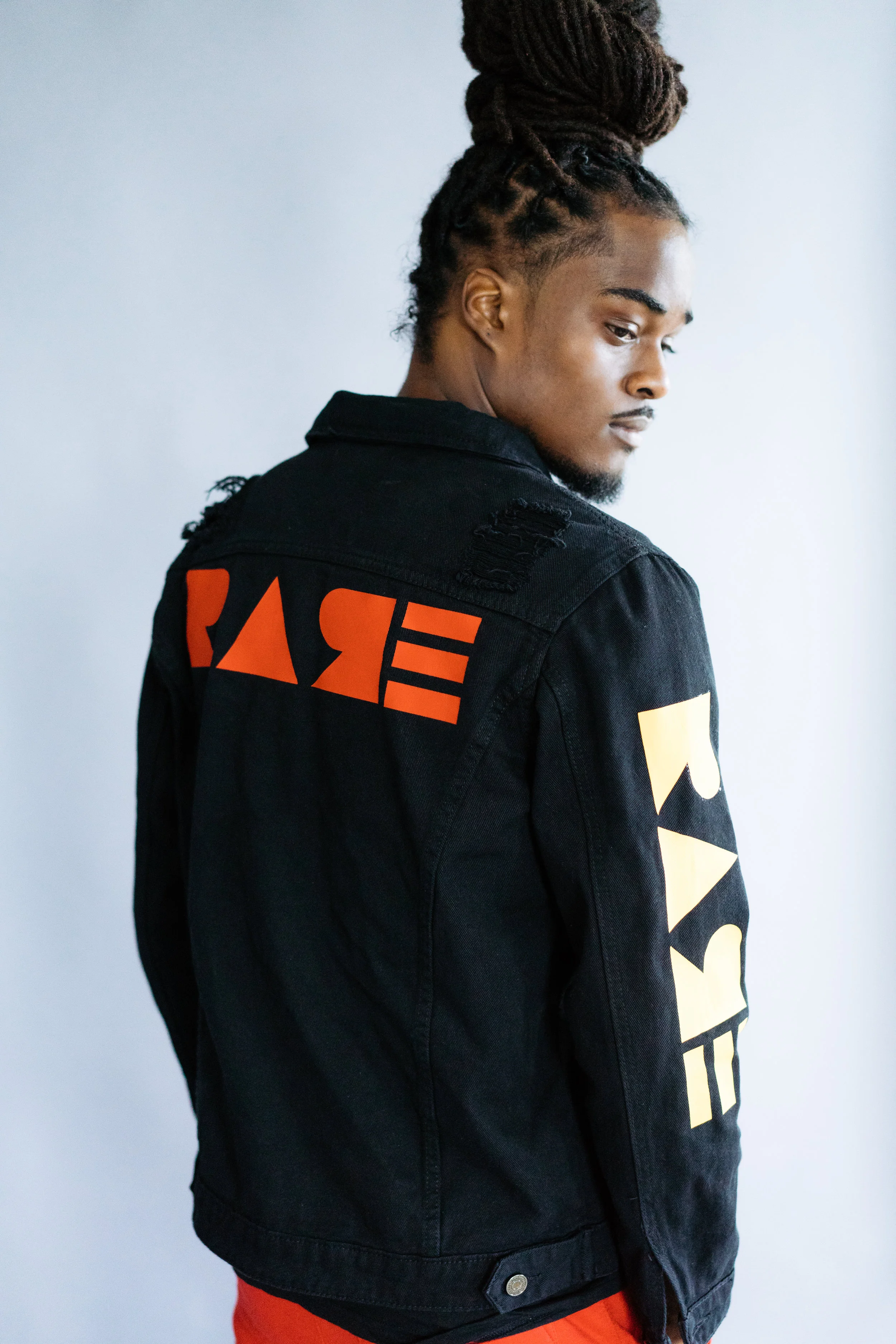 black and orange jean jacket