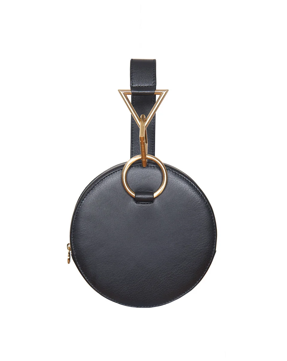 AZAR CLUTCH BAG by Tara Zadeh $570 artwork courtesy of Veronica Beard