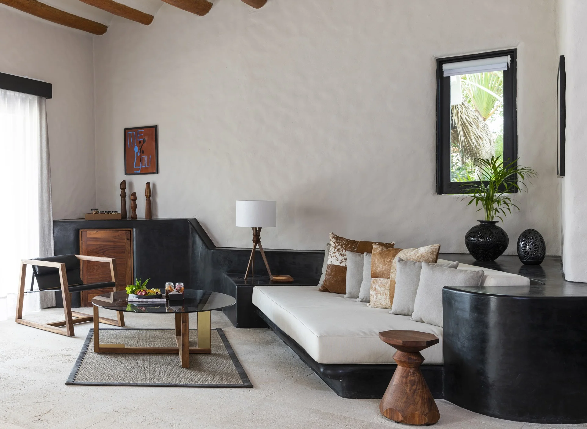 Thompson Zihuatanejo_Guest Room_Suite Seating Area.jpg