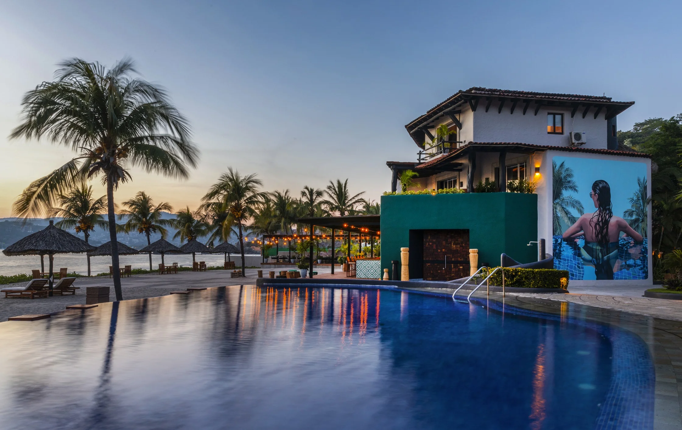 Thompson Zihuatanejo_Architecture_View of Pool and Mural 1.jpg