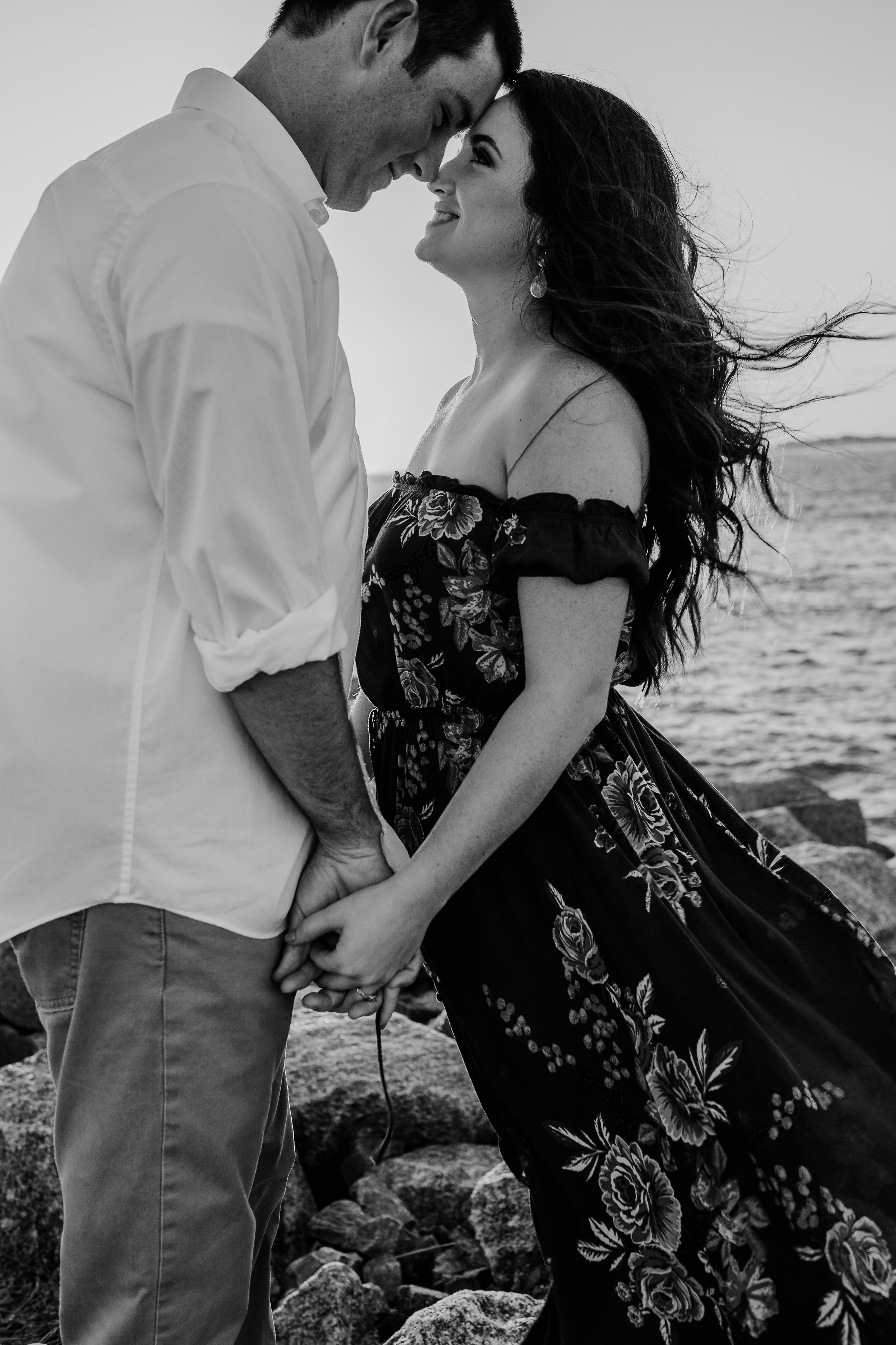 Daytona Beach engagement photographer shot in Ponce Inlet, Fl styled with a floral Sophie and Trey maxi dress