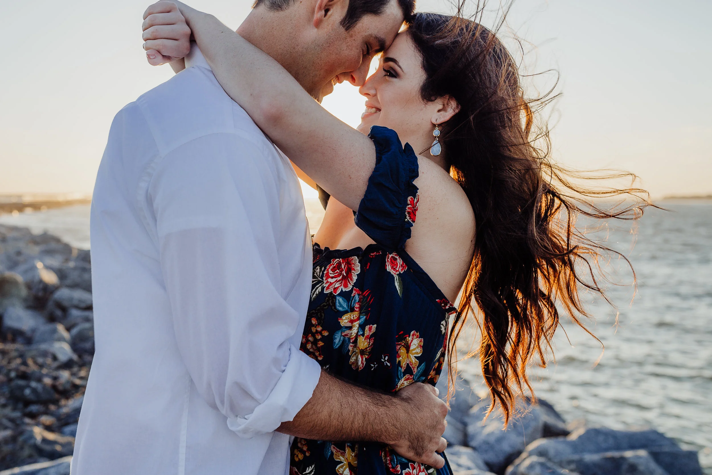 Daytona Beach engagement photographer shot in Ponce Inlet, Fl styled with a floral Sophie and Trey maxi dress