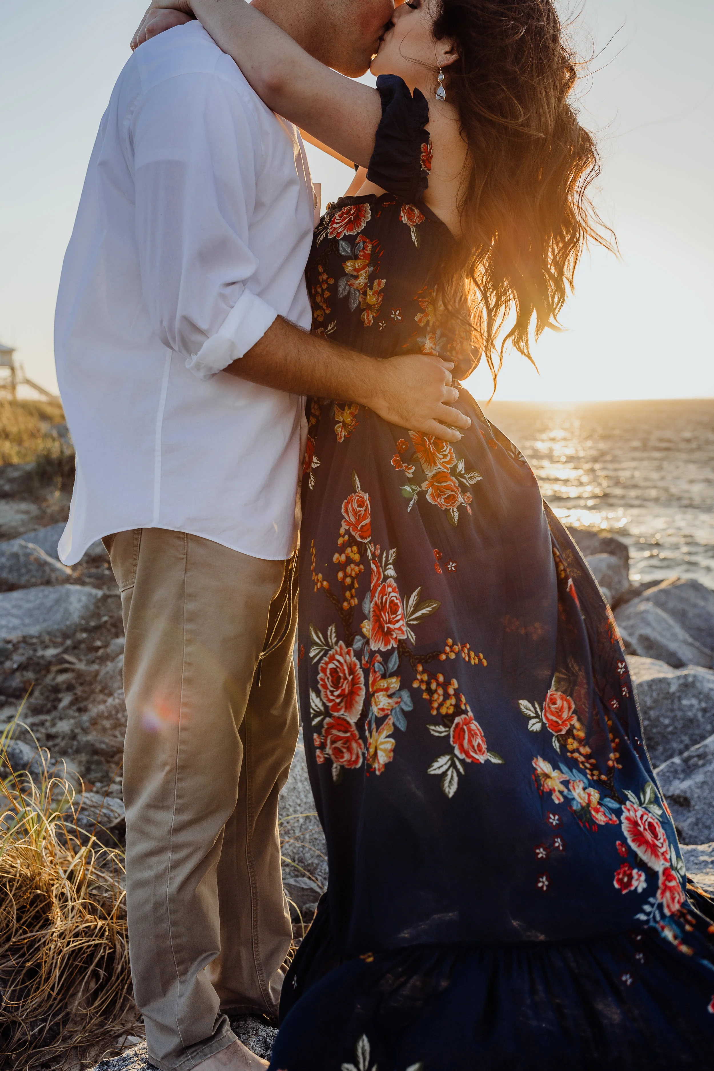 Daytona Beach engagement photographer shot in Ponce Inlet, Fl styled with a floral Sophie and Trey maxi dress