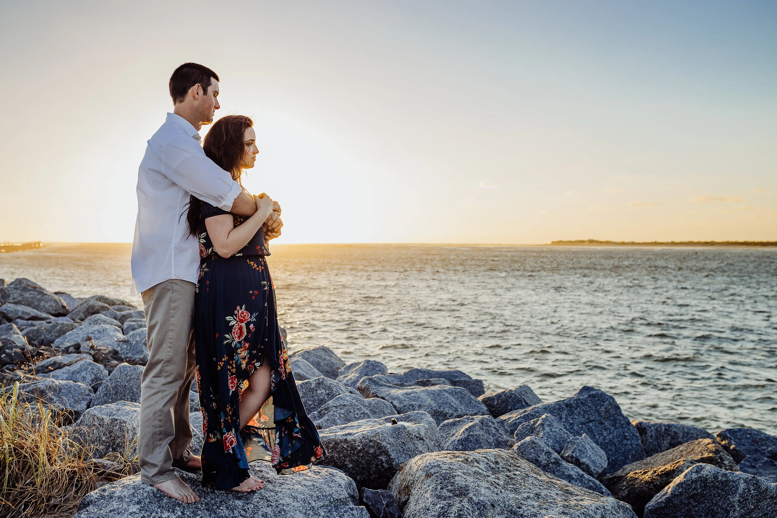 Daytona Beach engagement photographer shot in Ponce Inlet, Fl styled with a floral Sophie and Trey maxi dress
