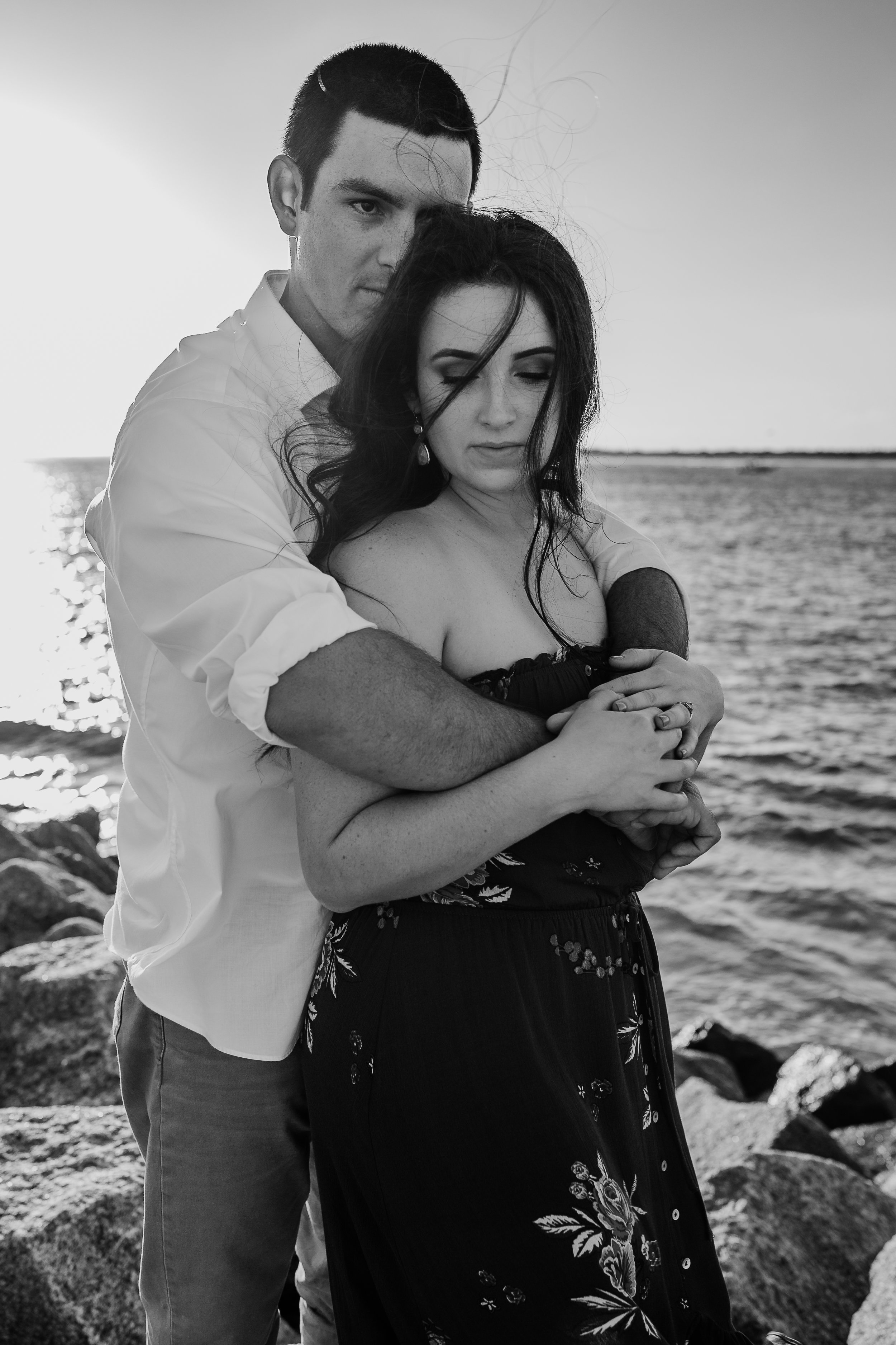 Daytona Beach engagement photographer shot in Ponce Inlet, Fl styled with a floral Sophie and Trey maxi dress