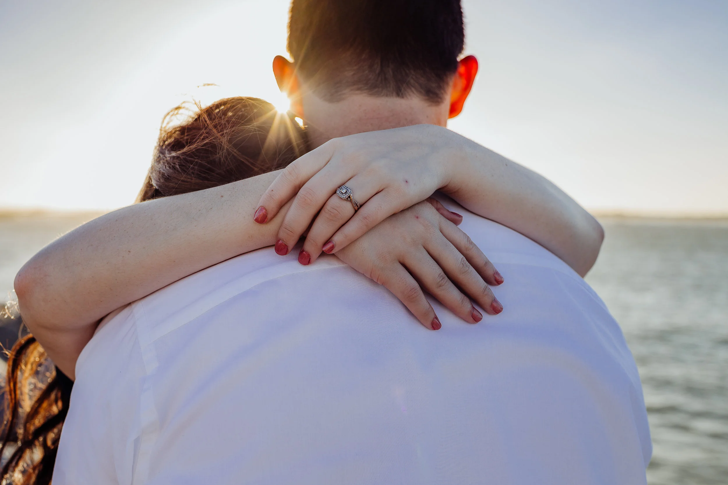 Daytona Beach engagement photographer shot in Ponce Inlet, Fl styled with a floral Sophie and Trey maxi dress